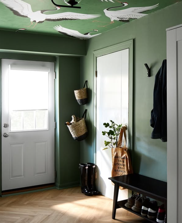 Mount Royal Calgary small space mudroom and hall entry renovation with custom millwork, smart storage solutions, and modern transitional design details.