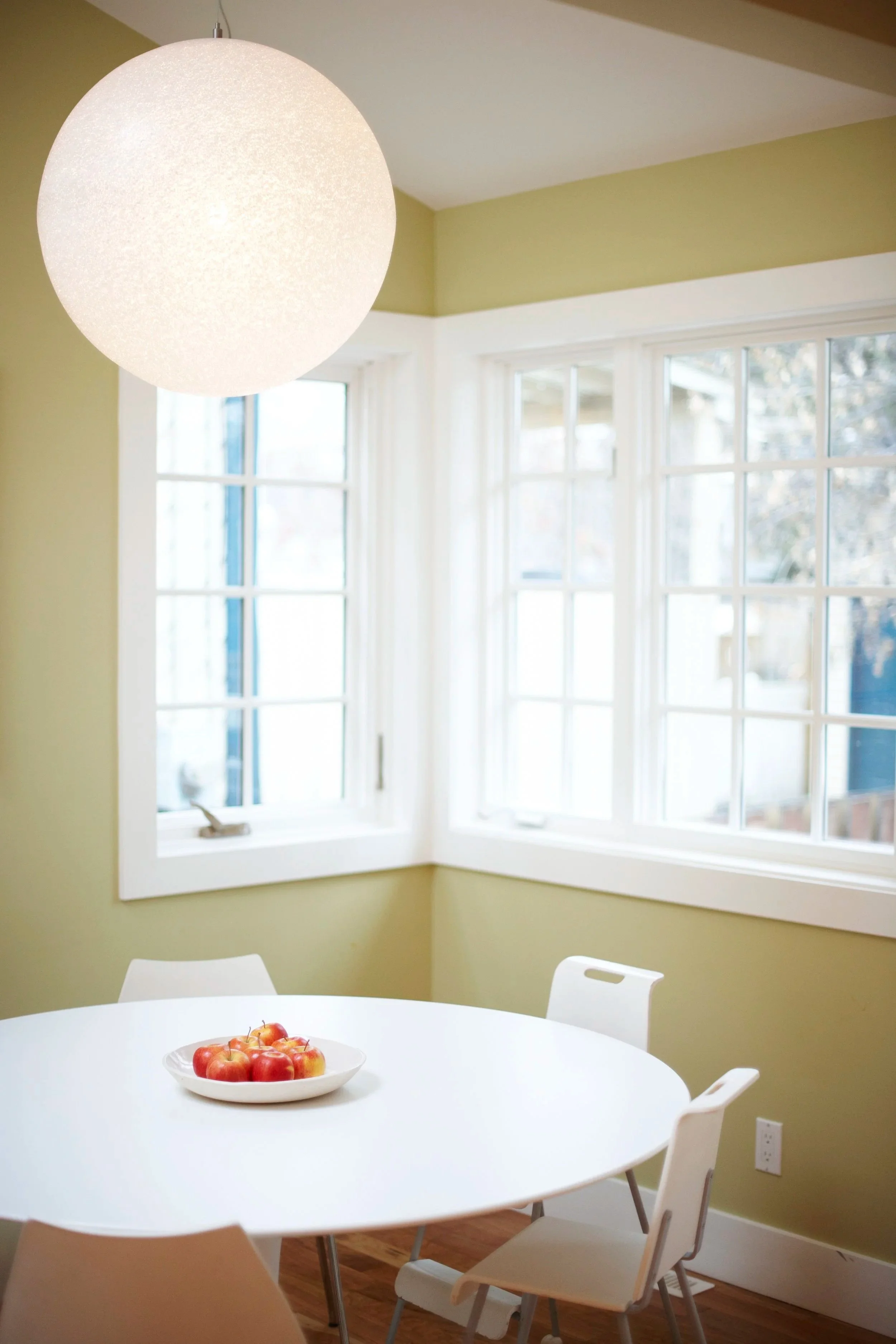 Custom Calgary Altadore kitchen renovation with quartz countertops, custom cabinetry, modern lighting, and open-concept design for functional, energy-efficient family living