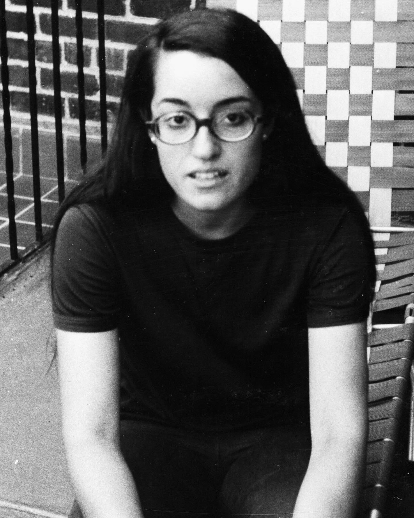 A photo of my Mom sitting on the front stoop of her family&rsquo;s house on Waring Avenue in The Bronx. The photo was taken in August of 1969, the day that she and some friends were about to depart for Woodstock, aka &ldquo;An Aquarian Exposition: 3 
