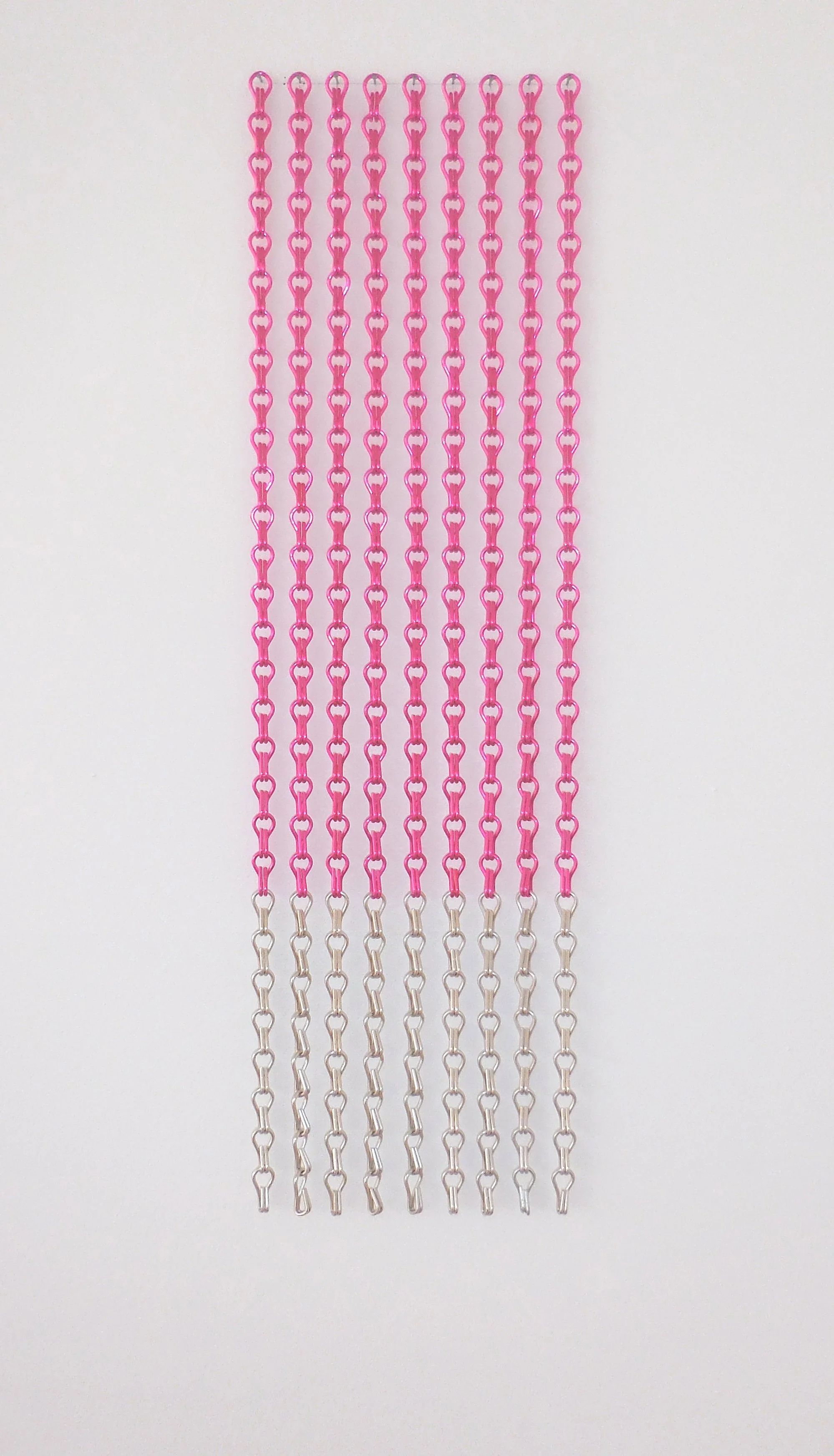 Multiple pink and silver plastic chains arranged vertically on a white background.