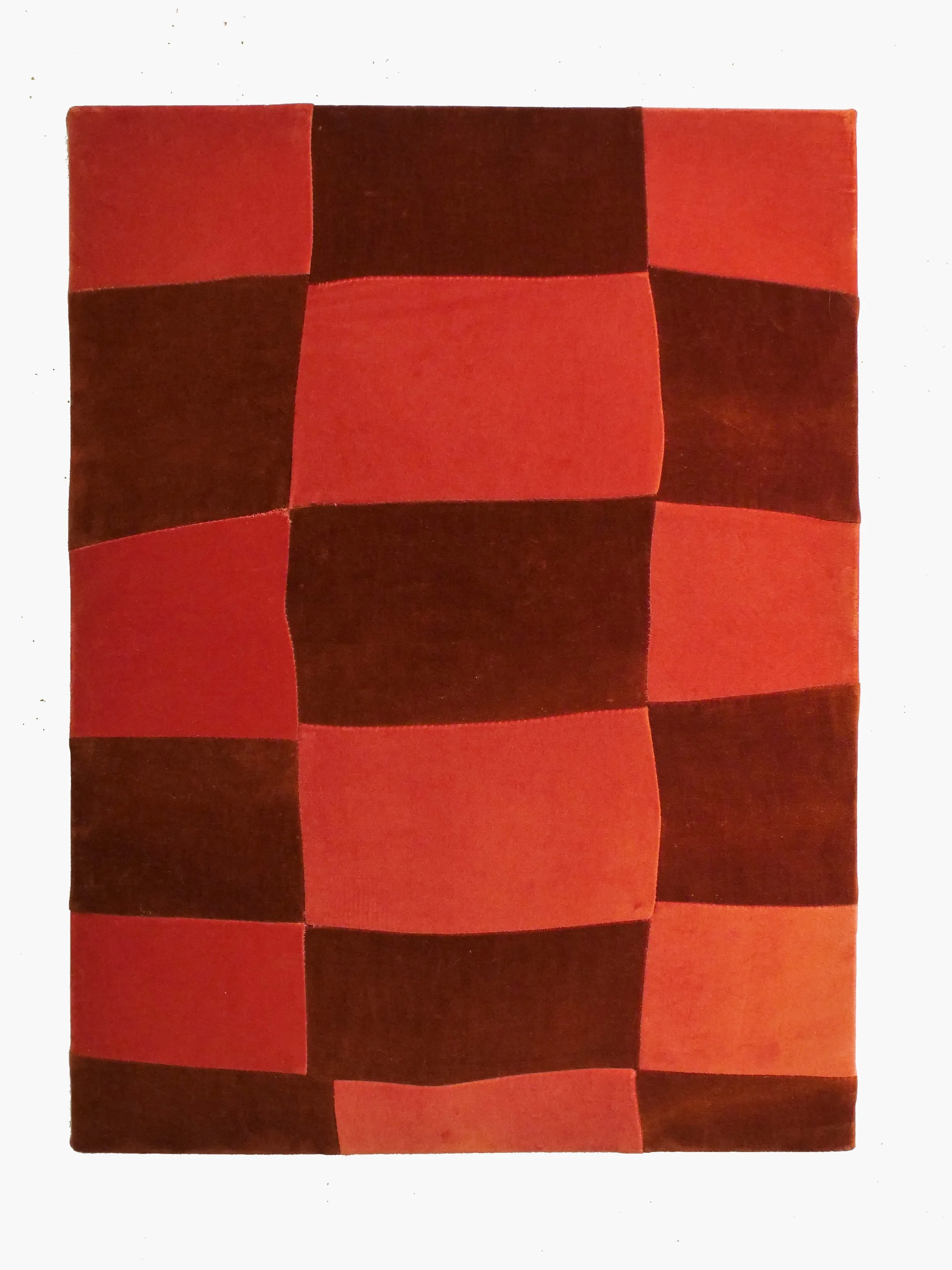 A rectangular area arranged in a grid of 16 squares with alternating red and dark red colors, resembling a checkered pattern.