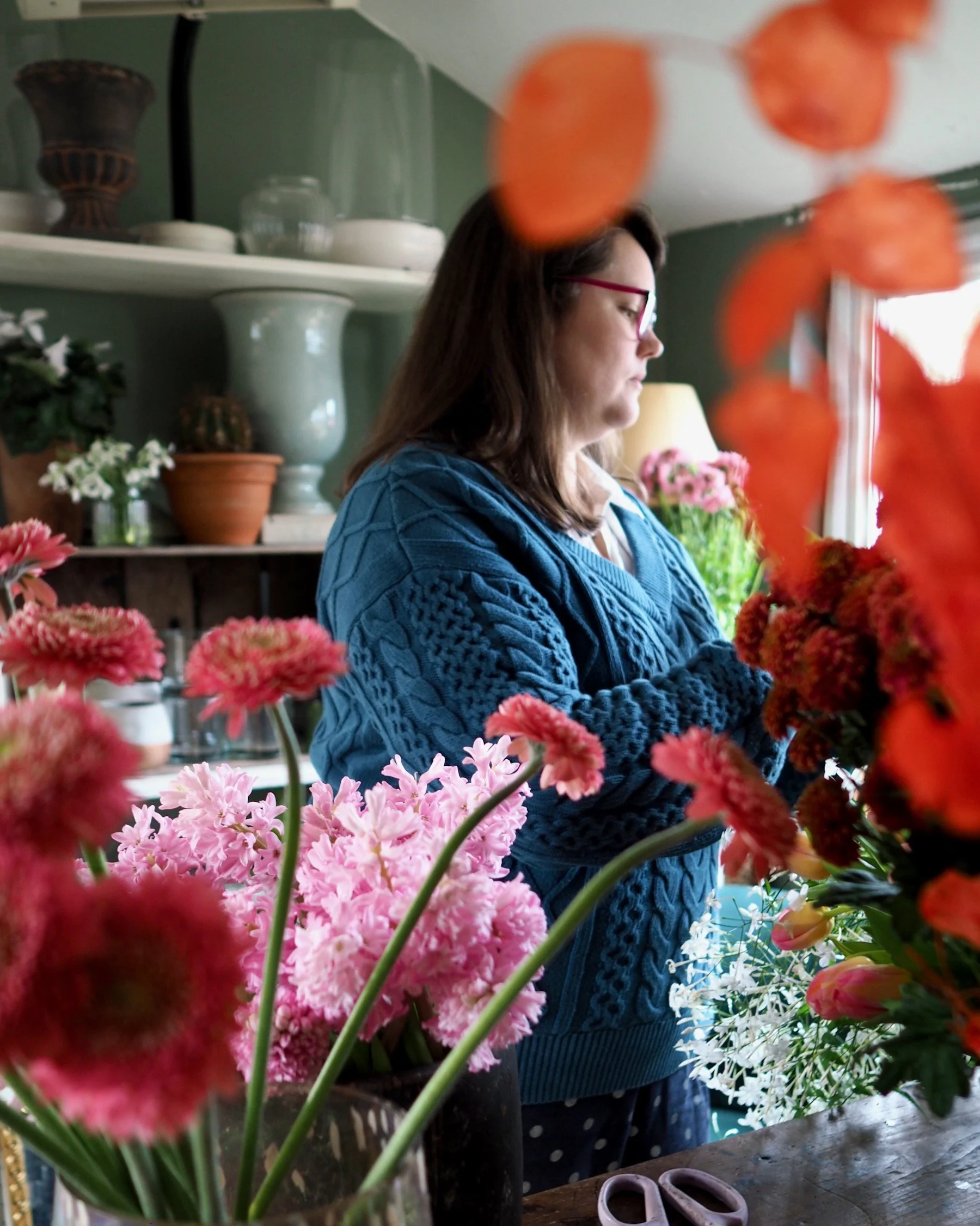 Florist boss holding a cup of tea