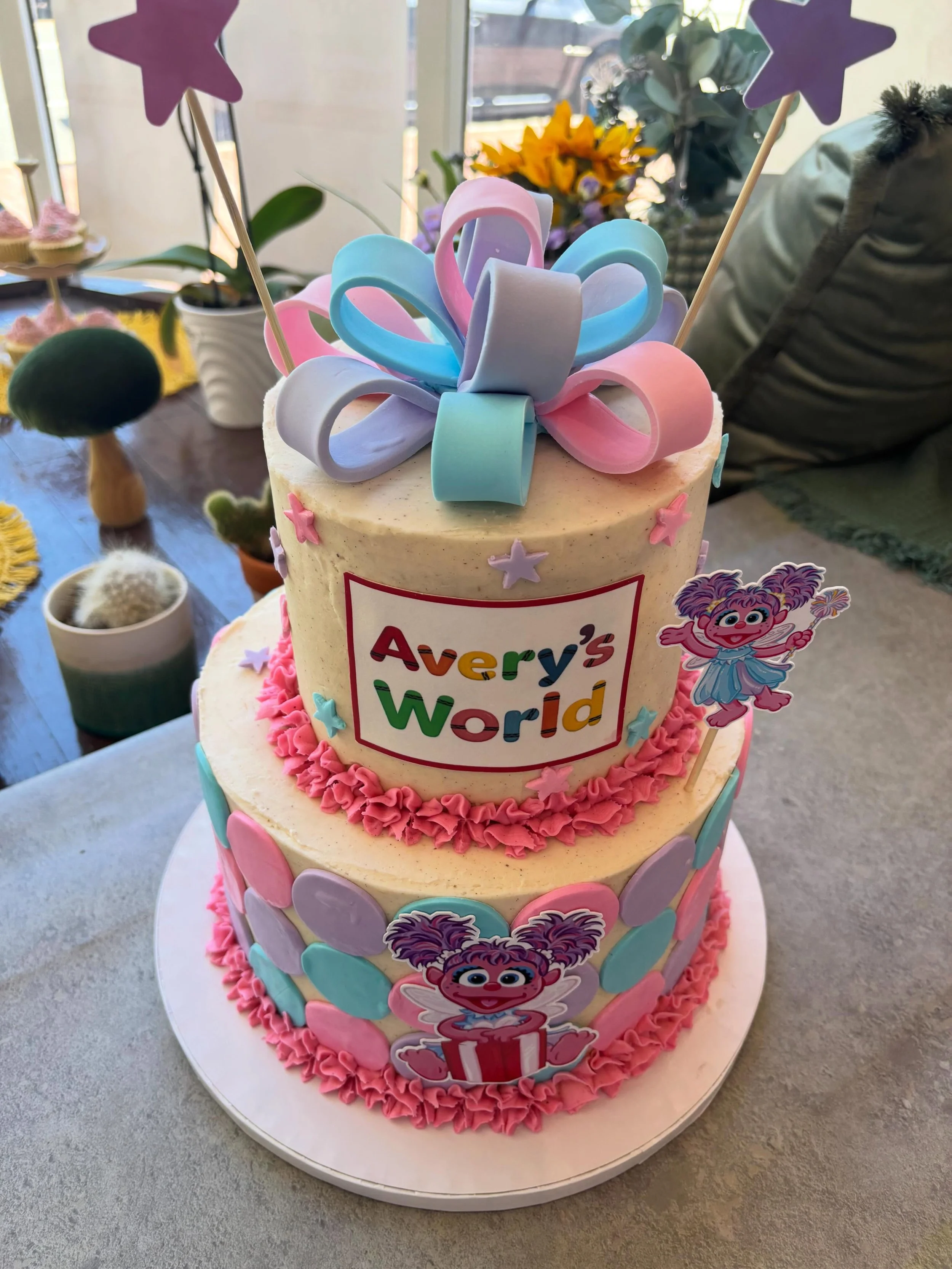I&rsquo;ve made the mistake in the past and underestimated how much work tiered cakes are. This cake took 3 of us to make properly. @jkauffs for her perfect leveling skillz, @dabbleden.creative to figure out the fondant bow and other elements and the