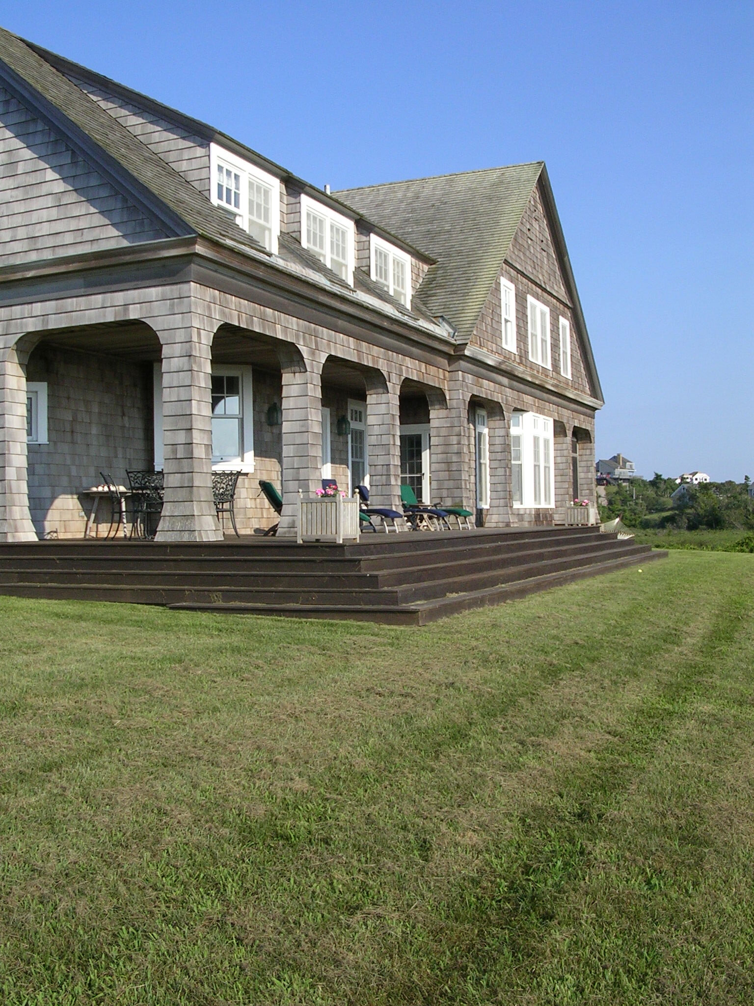The new-construction shorefront Shingle House house, on Block Island in Rhode Island, was designed with an open yet intimate interior by RDA. Robert Dean Architects.