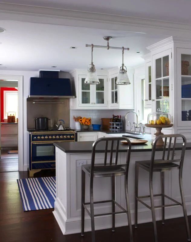This lakeside house in Connecticut features an Arts and Crafts–influenced pavilion to accommodate a busy family who enjoys entertaining. Robert Dean Architects, RDA. Kitchen