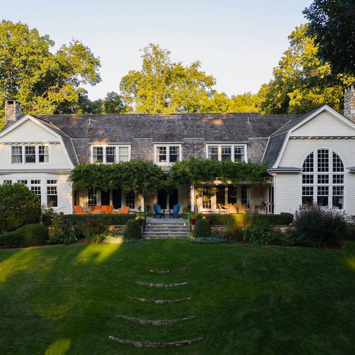 Tuesday Tip:  Remember that the outdoor rooms are just as important as the indoor rooms. 

Can you smell the #wisteria that blooms over this #pergola covered patio?  This new construction #shinglestyle house is gracious yet intimate. With all of the 