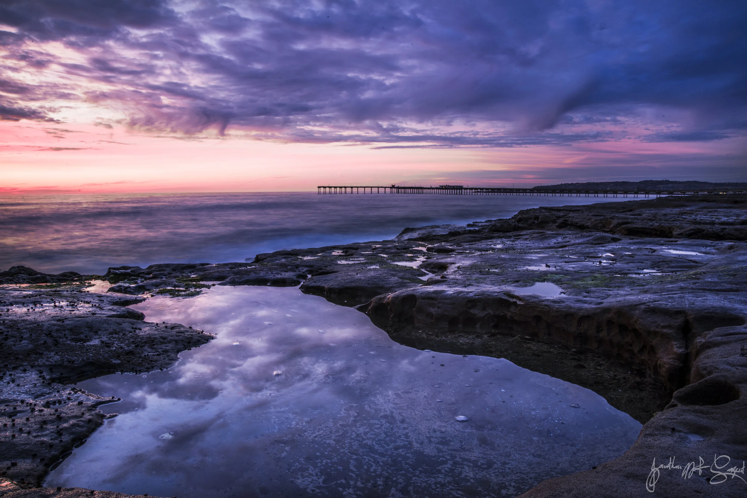 DSC_5766 purple sunset puddle rocks pier 2.jpg
