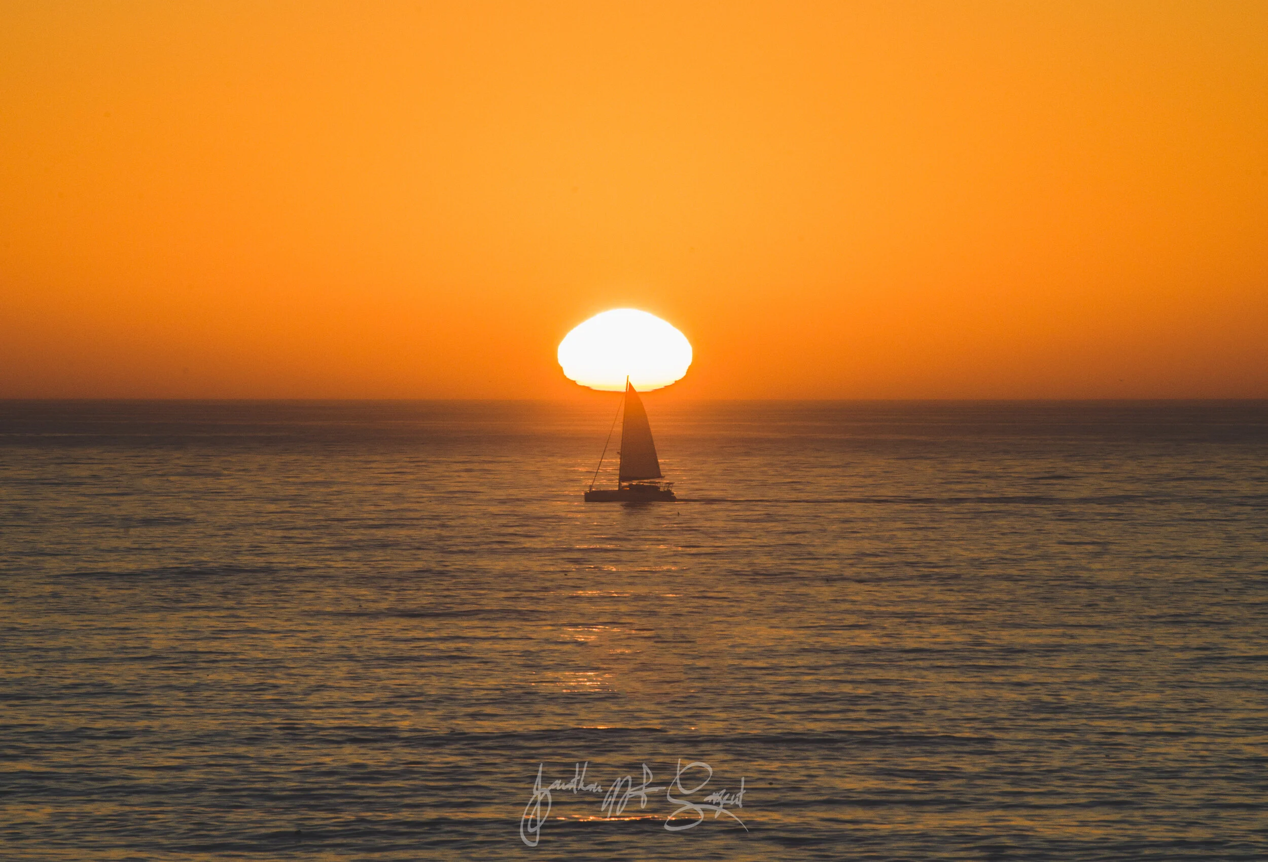 DSC_3985 sailboat in front of setting sun.jpg