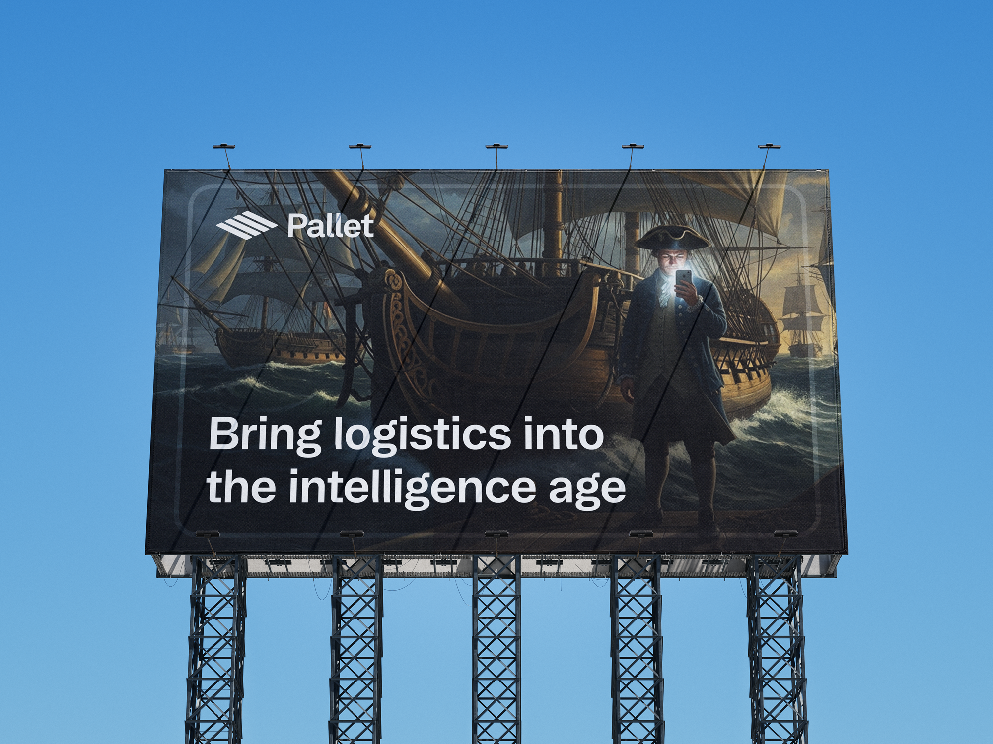 A billboard with an image of a large sailing ship and a 16th century sailor looking down at a smartphone. The billboard has the logo 'Pallet' and the slogan 'Bring logistics into the intelligence age'.