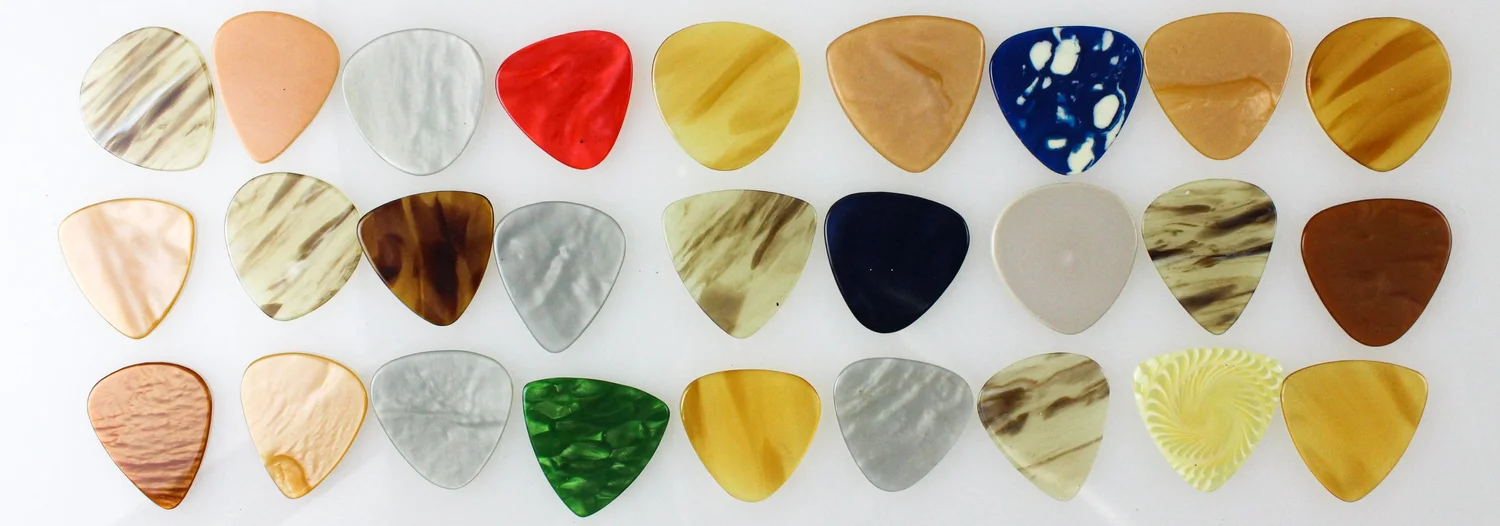 Apollo Picks | Custom Made. Casein and PEEK.