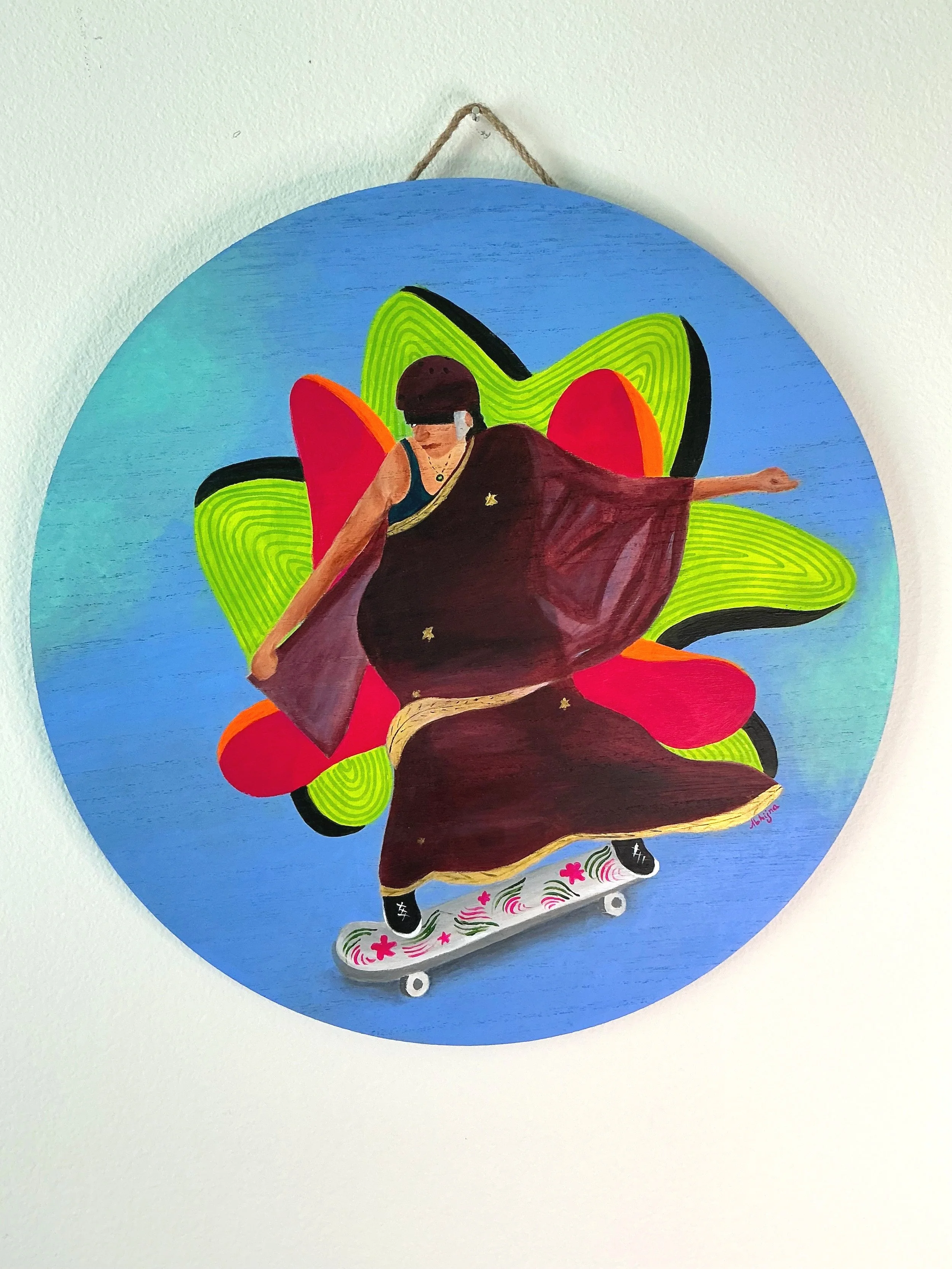 A circular painting featuring a woman roller skating over a colorful flower background with green and red petals, set against a blue sky.