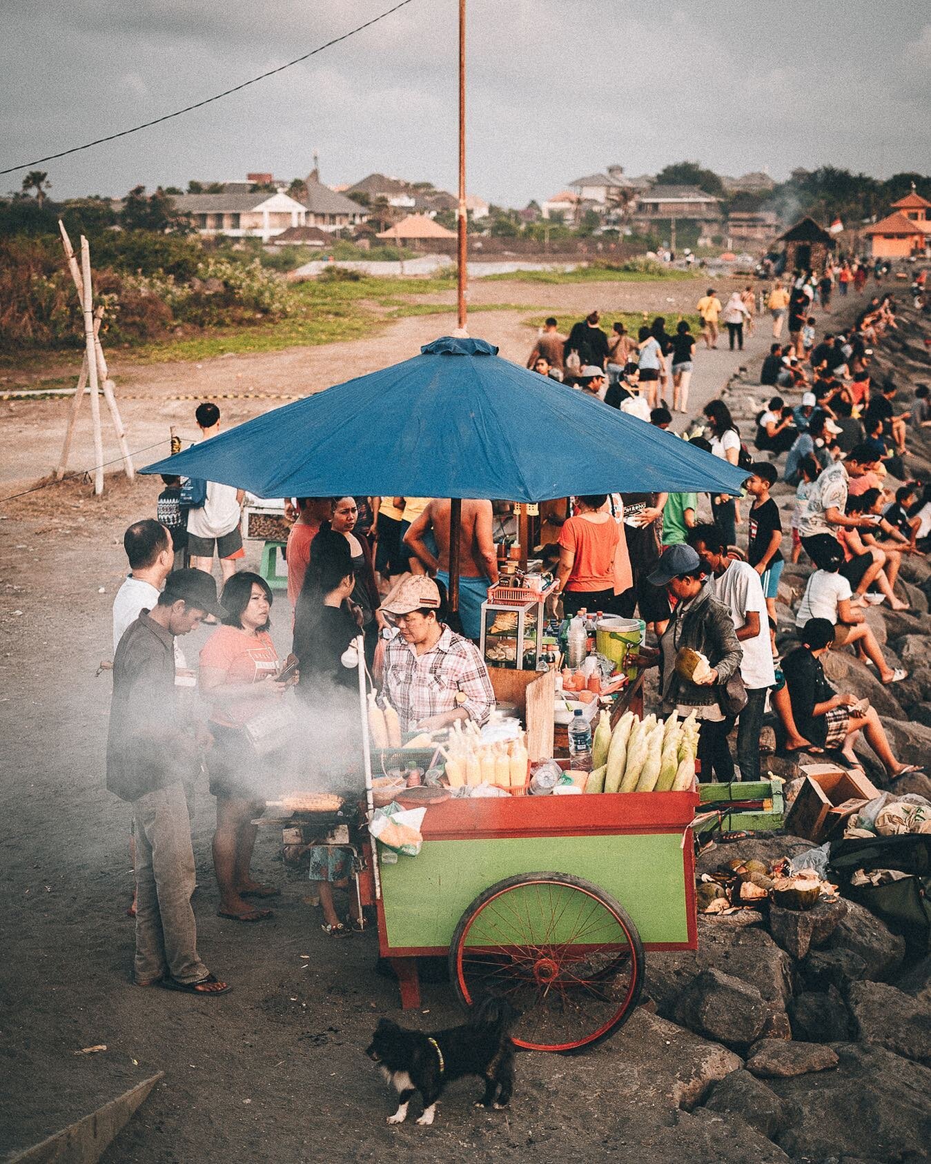 When I&rsquo;m not writing or surfing, my camera and I venture out and watch the locals eat corn on the cob for sunset. 🤙🏼🌊 #balilivin