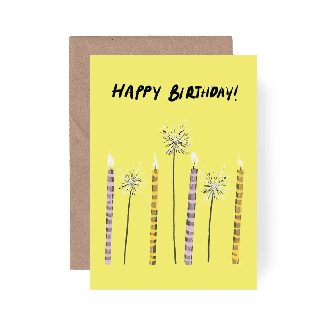 Birthday candles and sparks - white BG .jpg