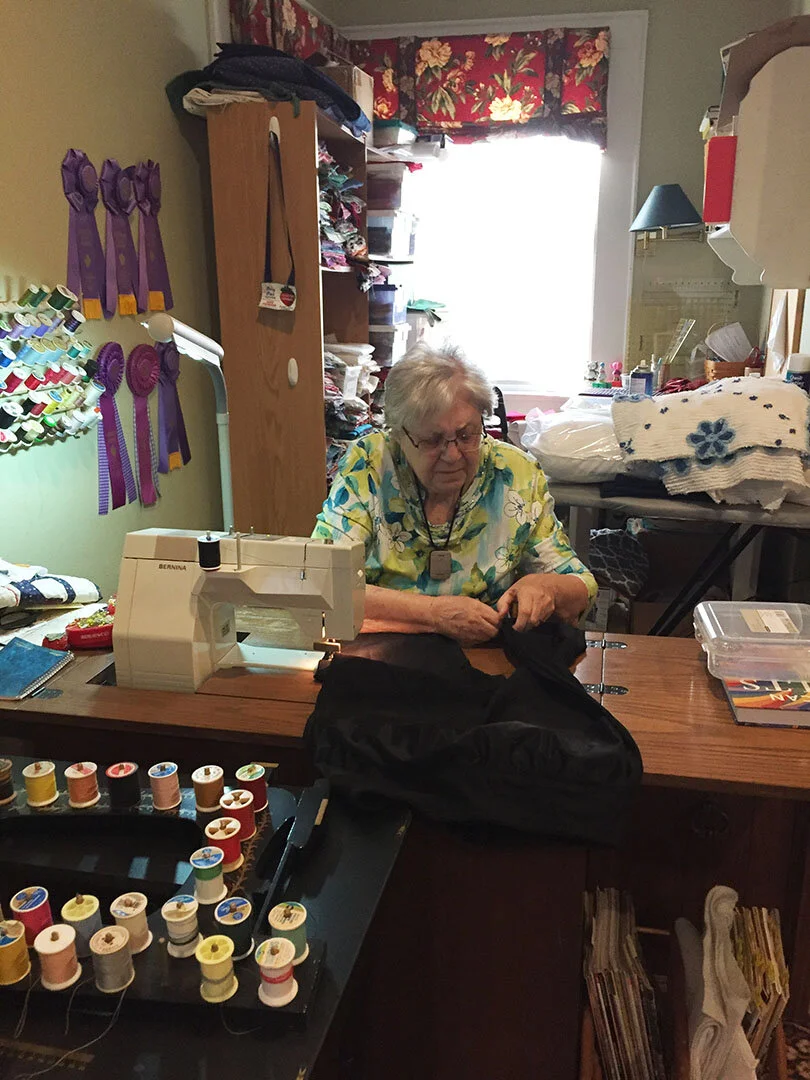My mom, Dixie, working in her sewing room on another project.
