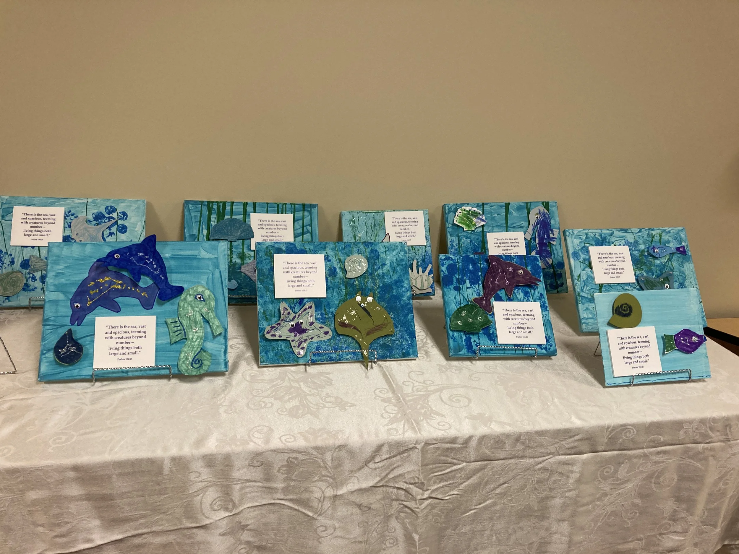Each adult with special needs painted their canvases adding coral and seaweed then added a bible verse and their sea creature on top.