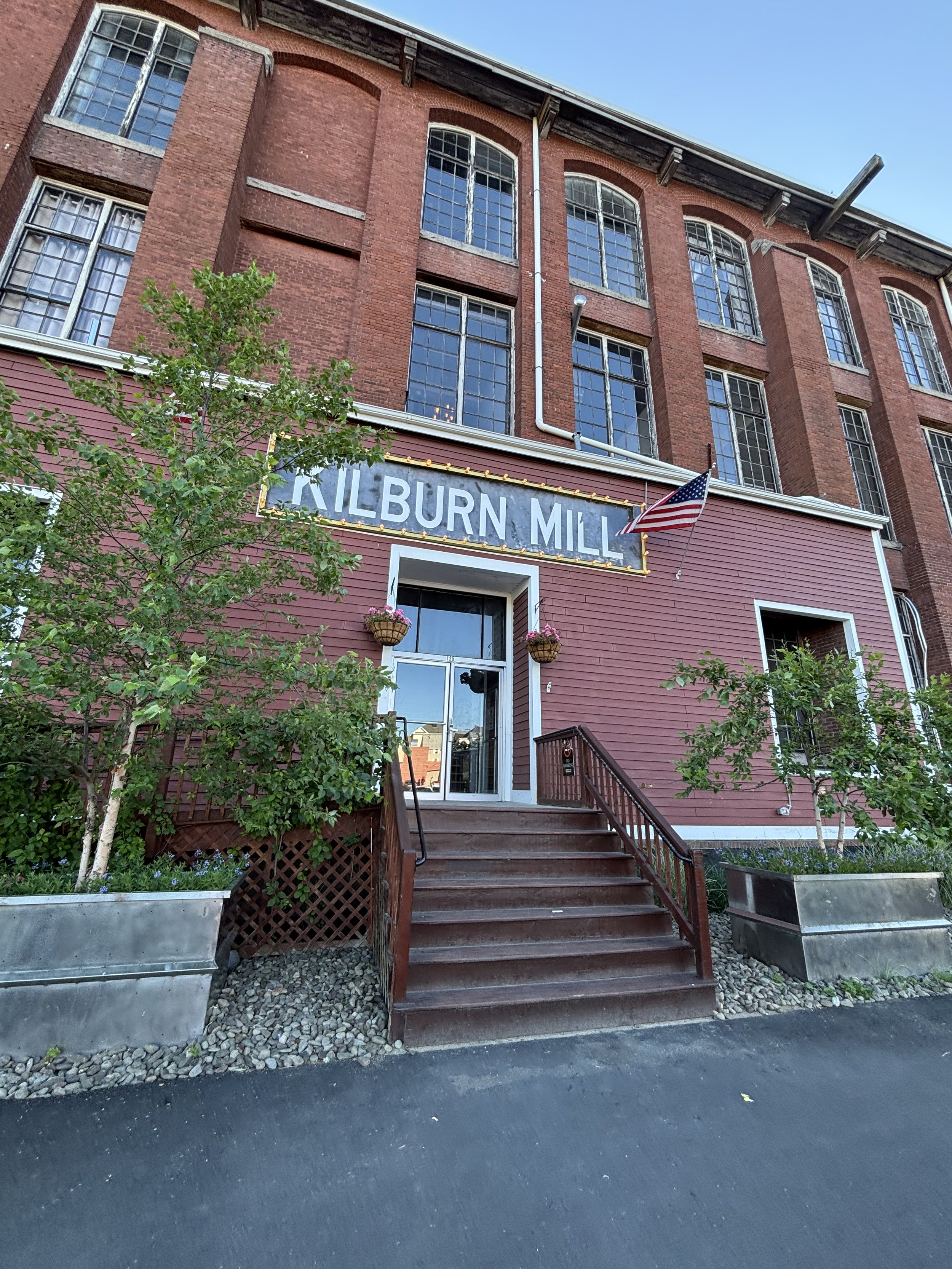 Photo of exterior of Kilburn Mill in New Bedford MA. Home of The Garnet Heart office space.