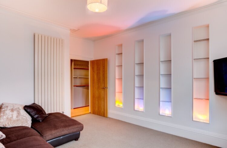 Modern lounge with LED light feature.