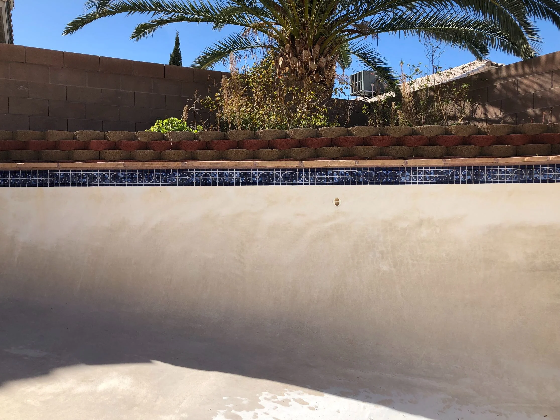 A pool needs periodic draining to maintain clean and clear water and ensure the pool's overall health.