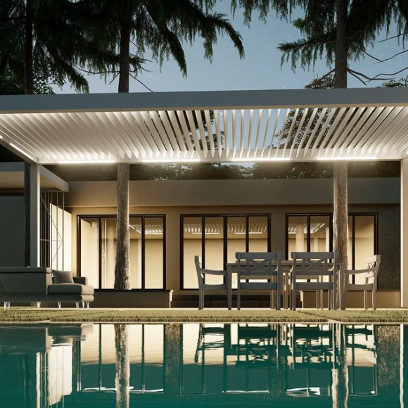 Motorized modern patio with pergola, outdoor seating, and pool at night