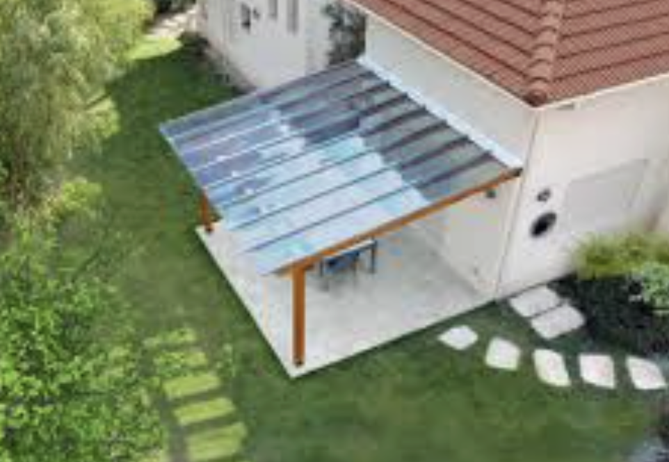 Polycarbonate patio cover installation in San Diego backyard, glass-like roof panels over existing structure