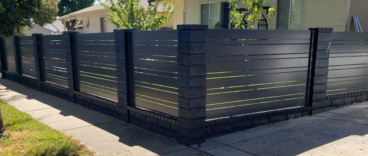 Aluminum fence between pillars in san diego