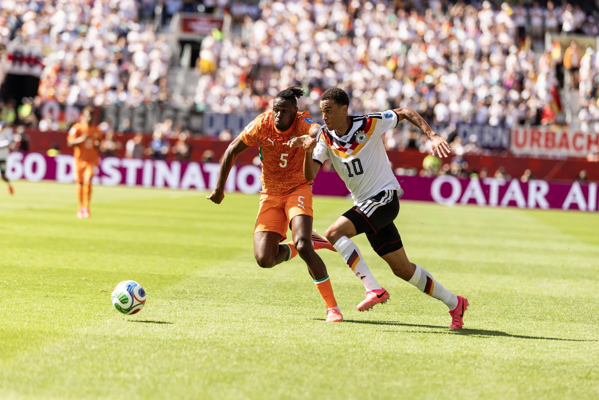 jamal-musiala- wilfried-singo-face-off-toronto-stadium.jpg