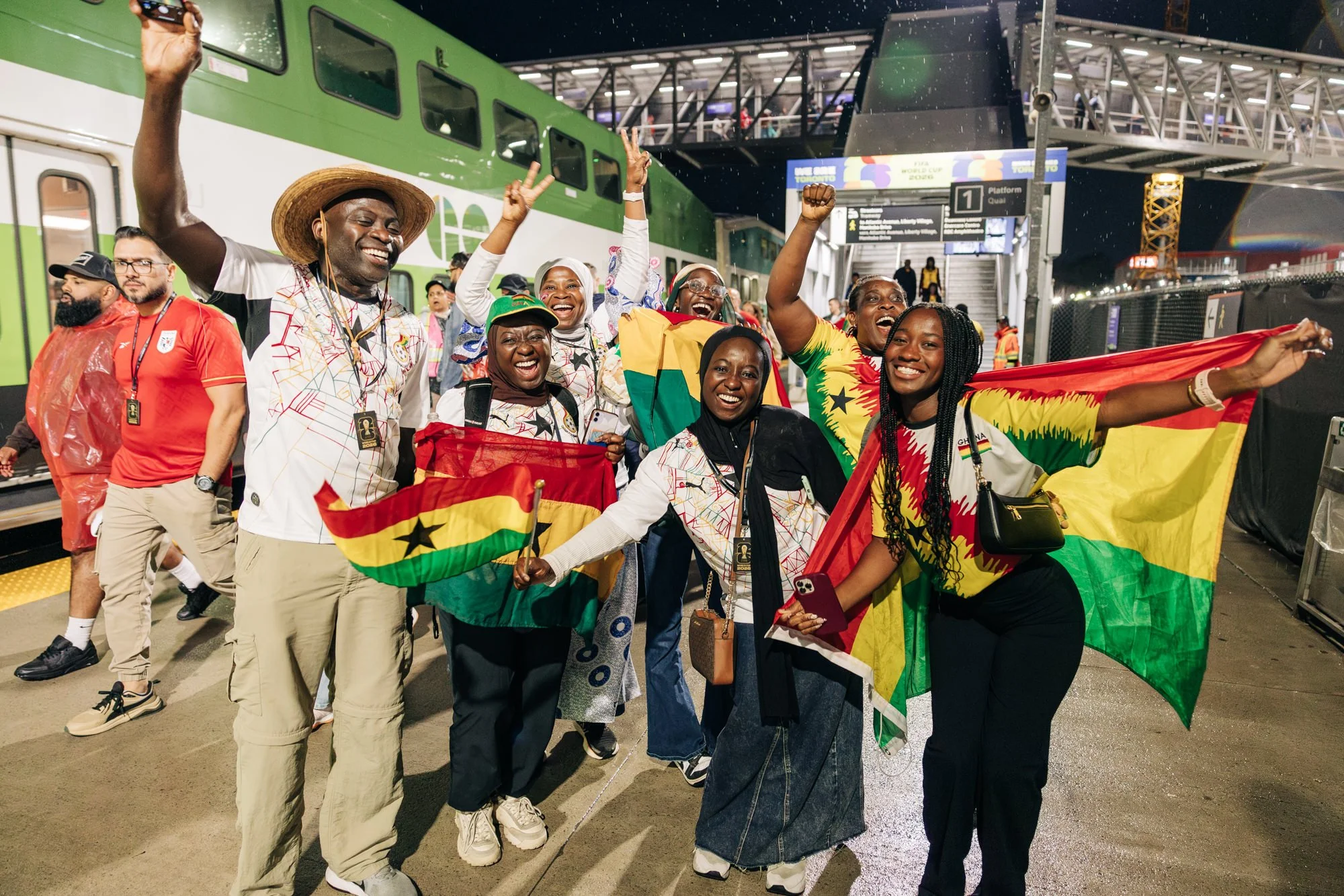 ghana-fans-celebrating-win-at-exhibition-go-station.jpg