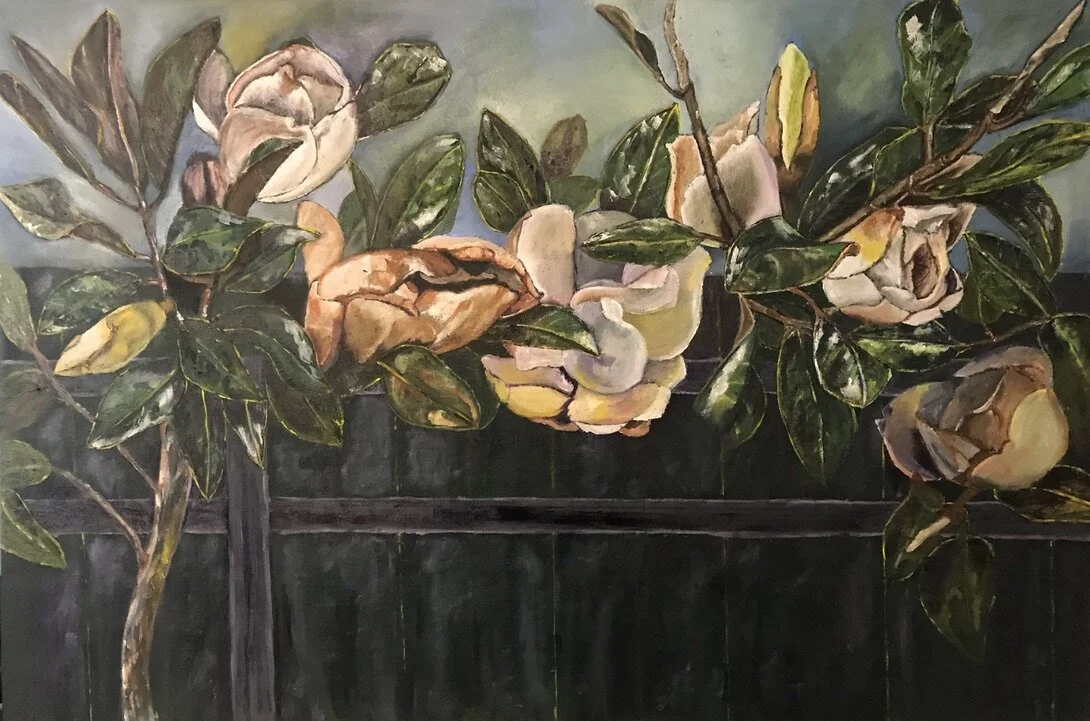 Magnolias on a fence.jpeg