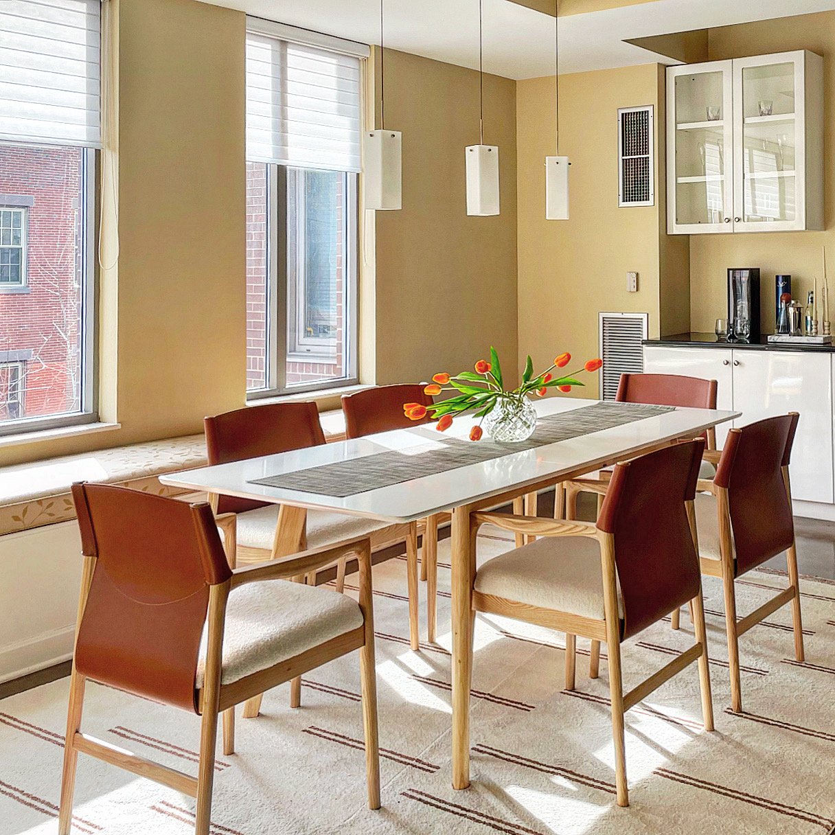 Dining Room with Leather & Boucle Chairs