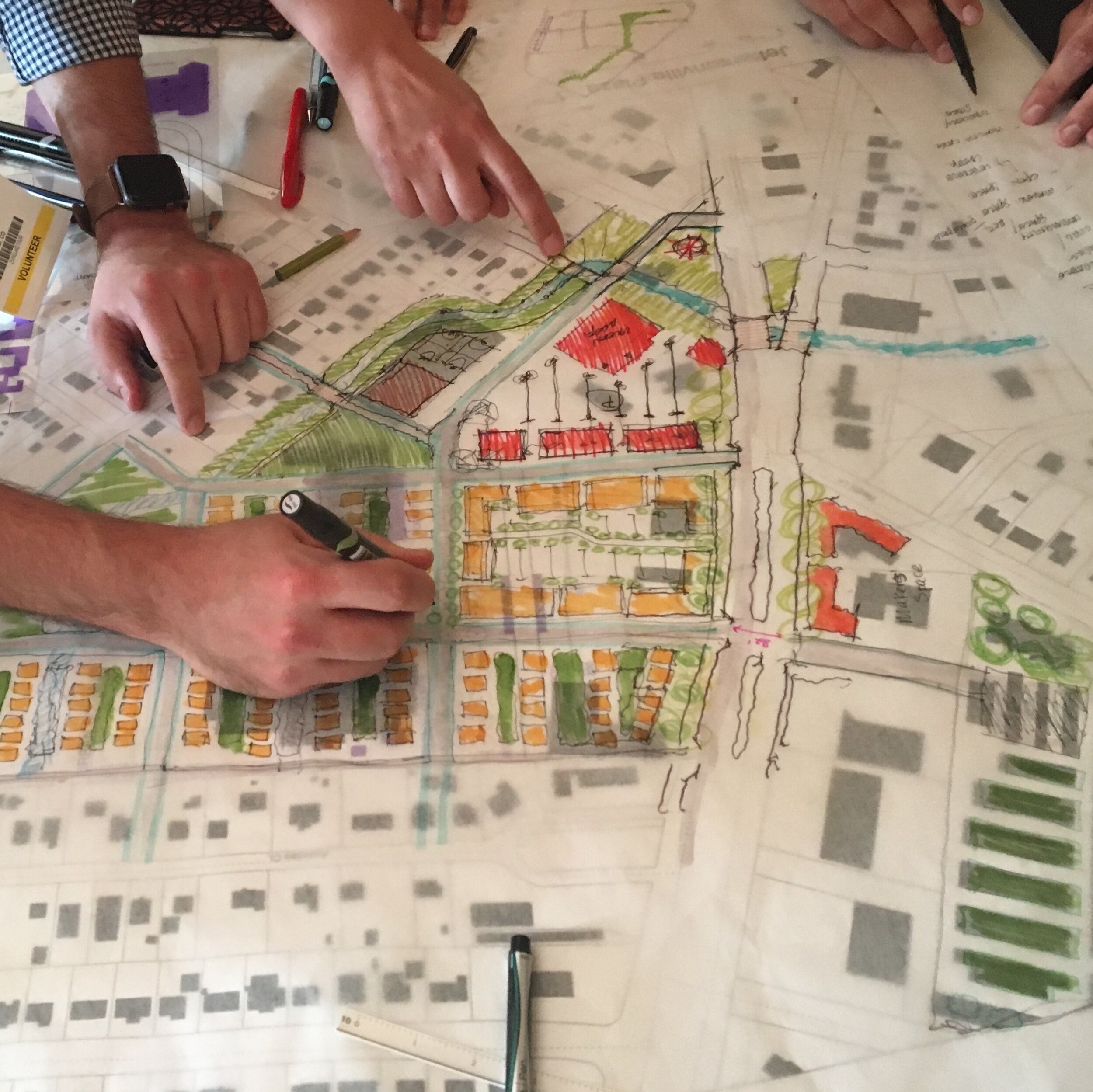 Participants sketching in a retrofitting suburbia workshop. June and Ellen regularly offer workshops for designers, urban planners, and students.