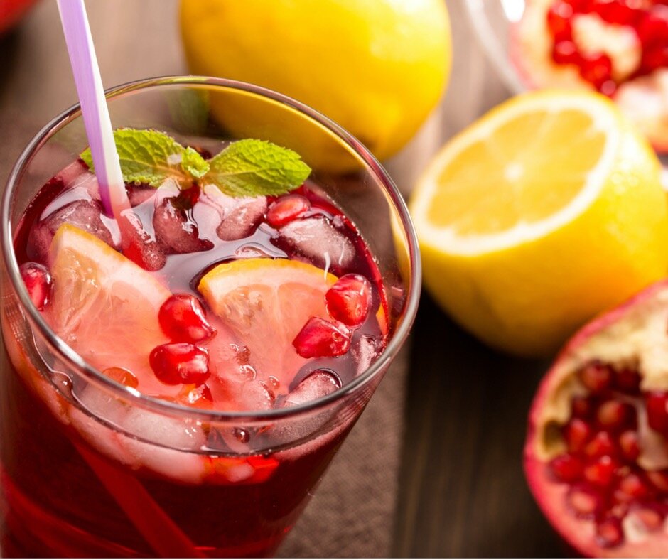 pomegranate-with-lemon-and-ice-top-view-picture-id492368898-2.jpg