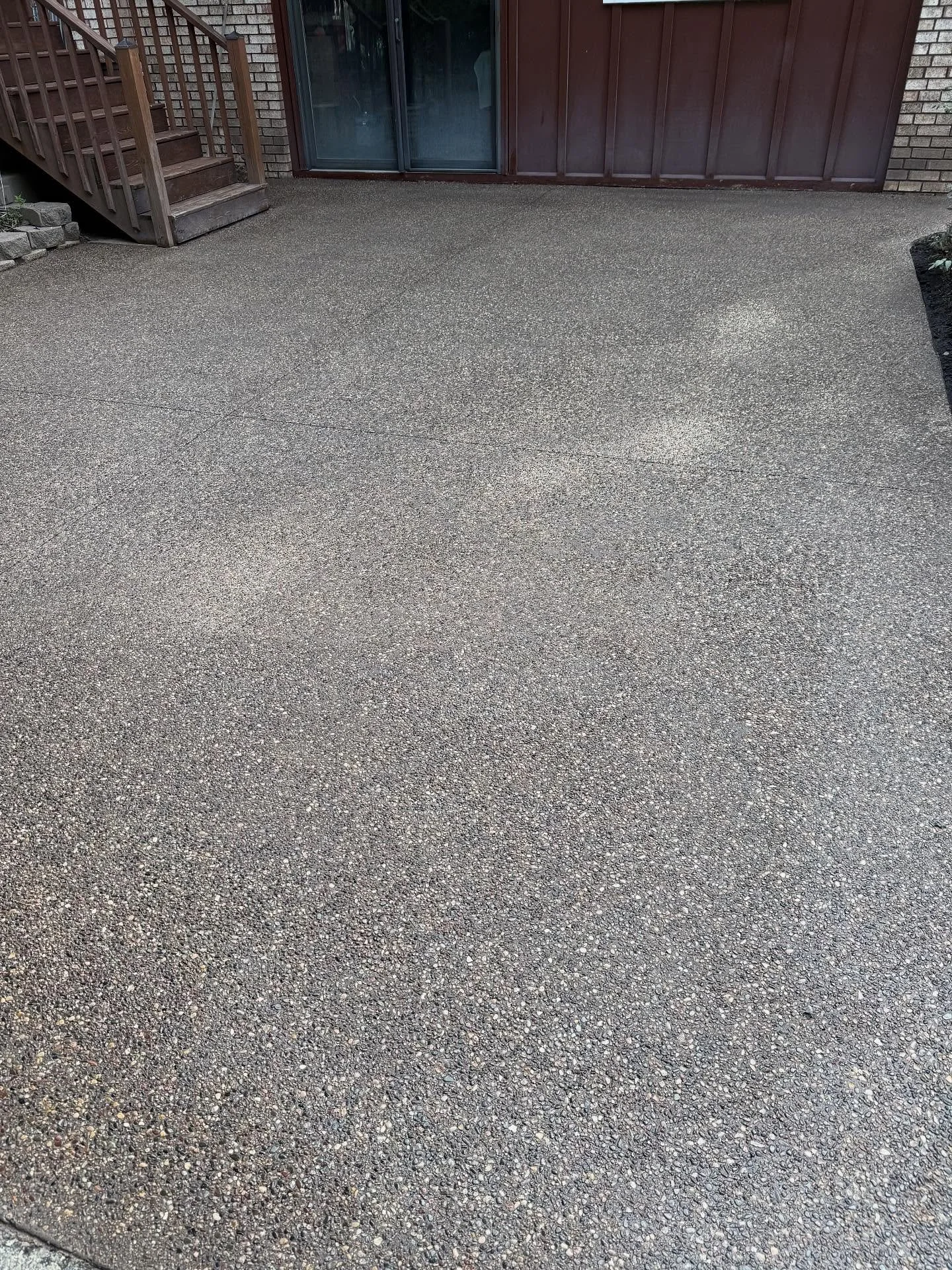Colored and exposed aggregate patio. Balsam Wood 2 bag color.