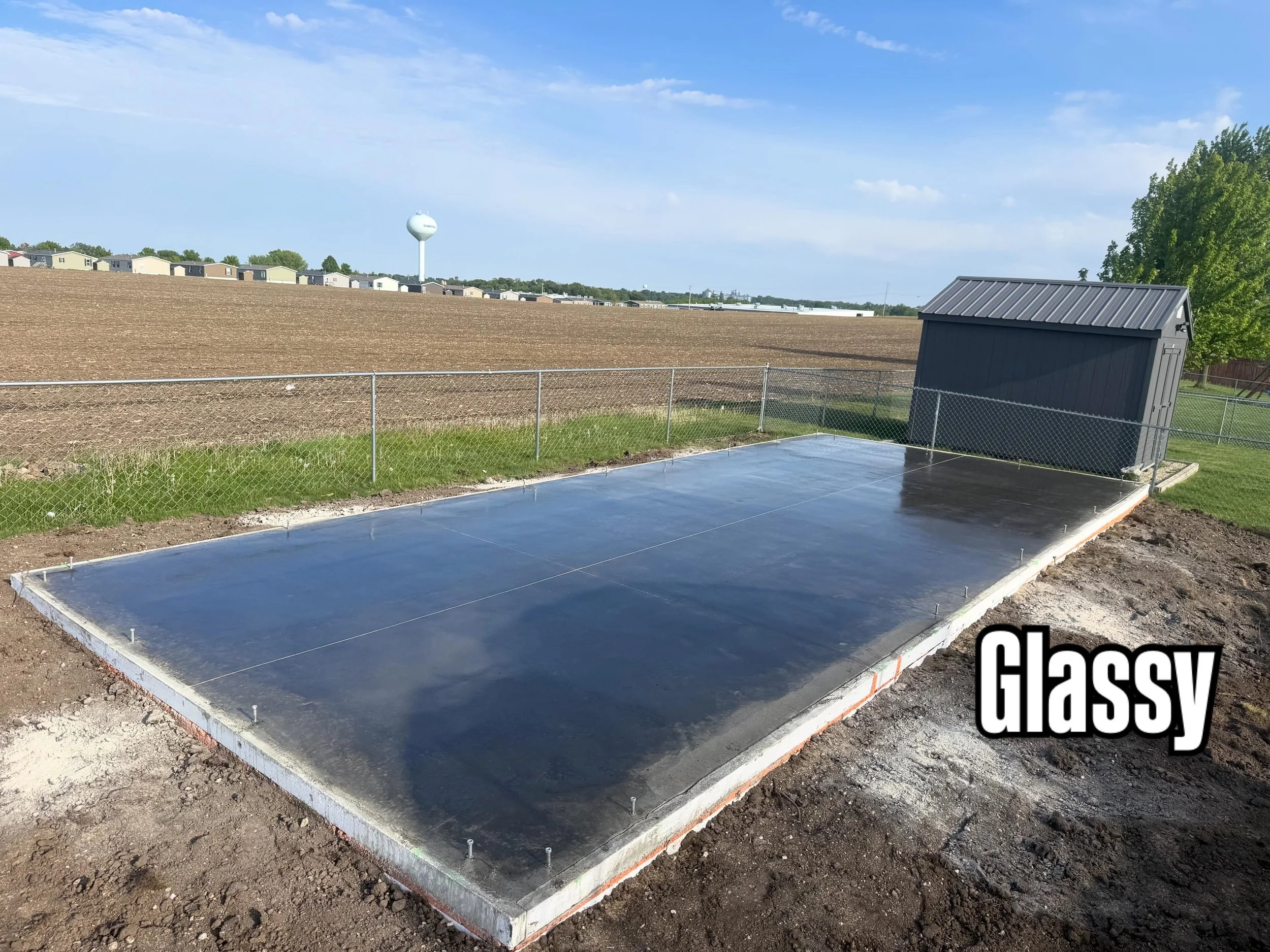 Glassy new workshop pad with a shallow frost protected footing using EZ Monoslab from @farrellequipment