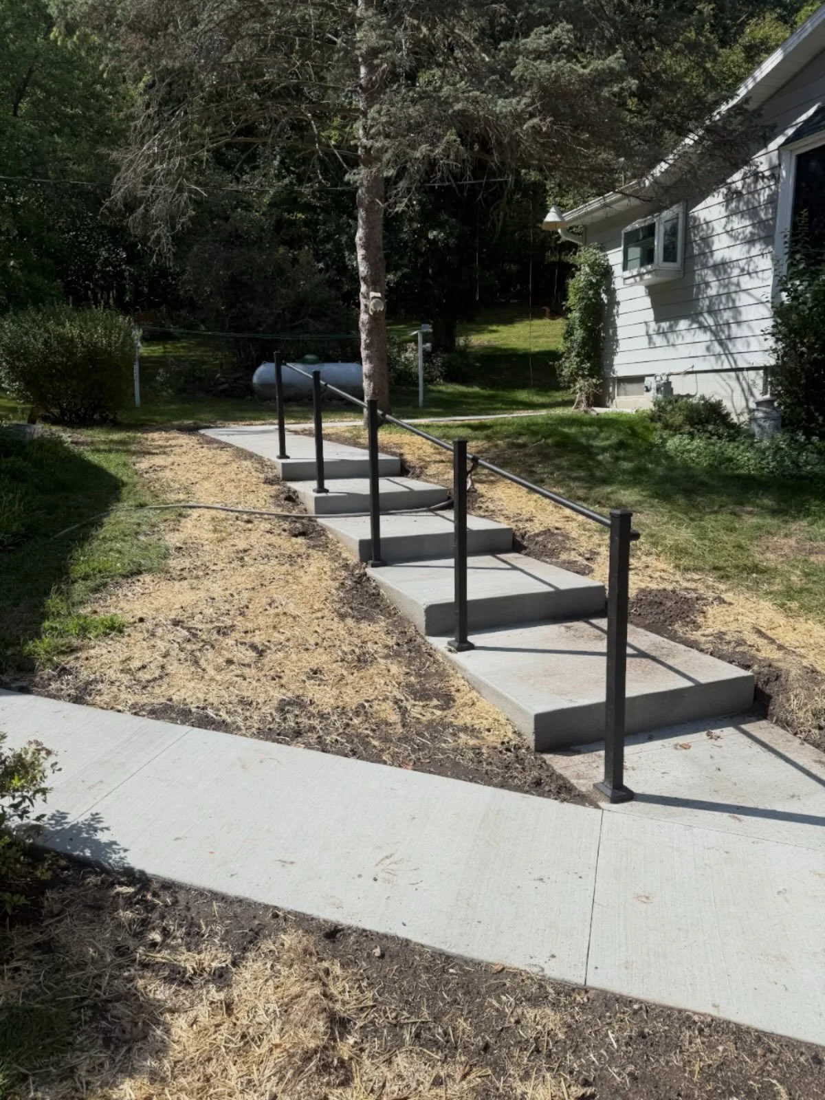 Walkway with stairs and a handrail