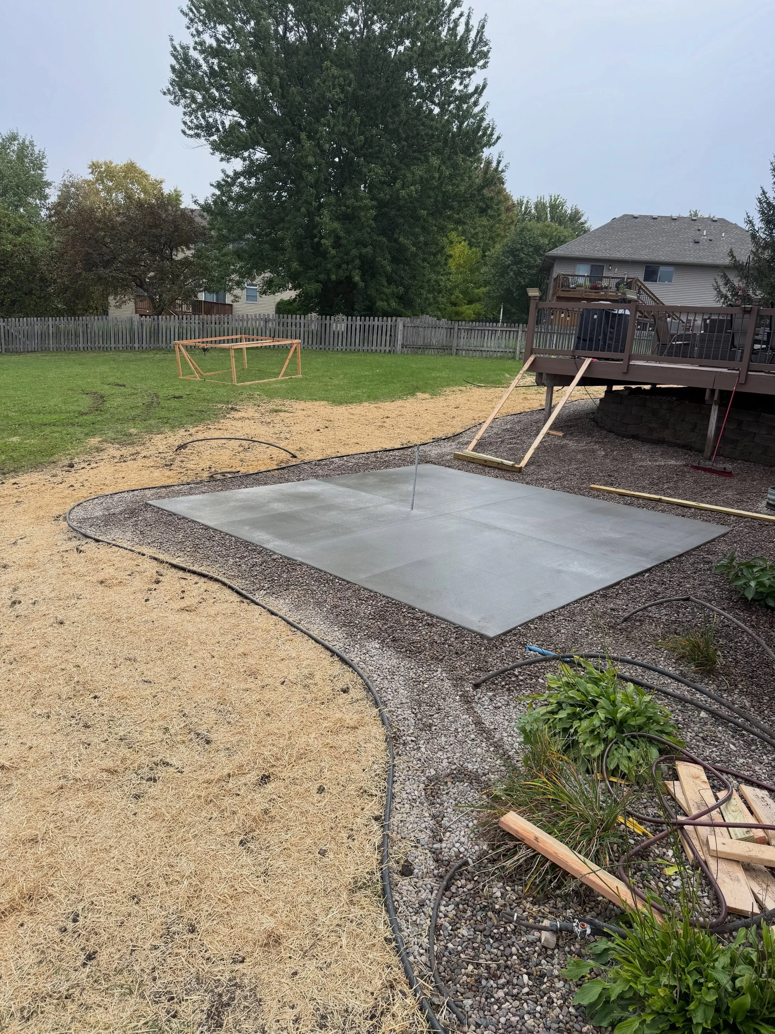 Hot tub pad and landscaping