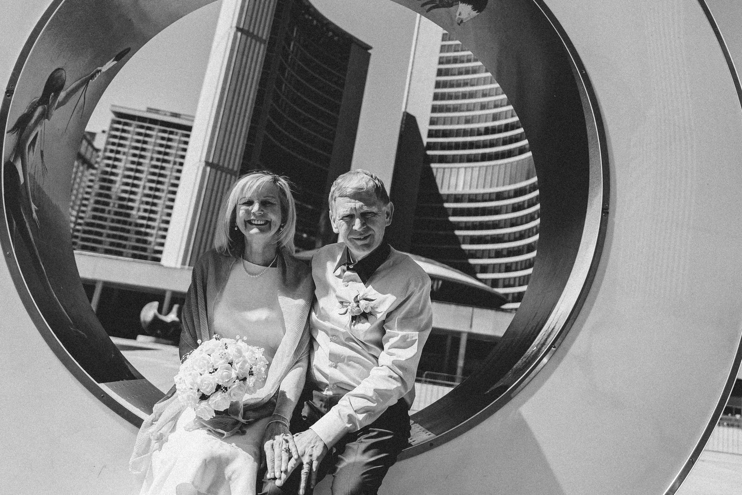 Minimal wedding ceremony with older couple in Toronto City Hall