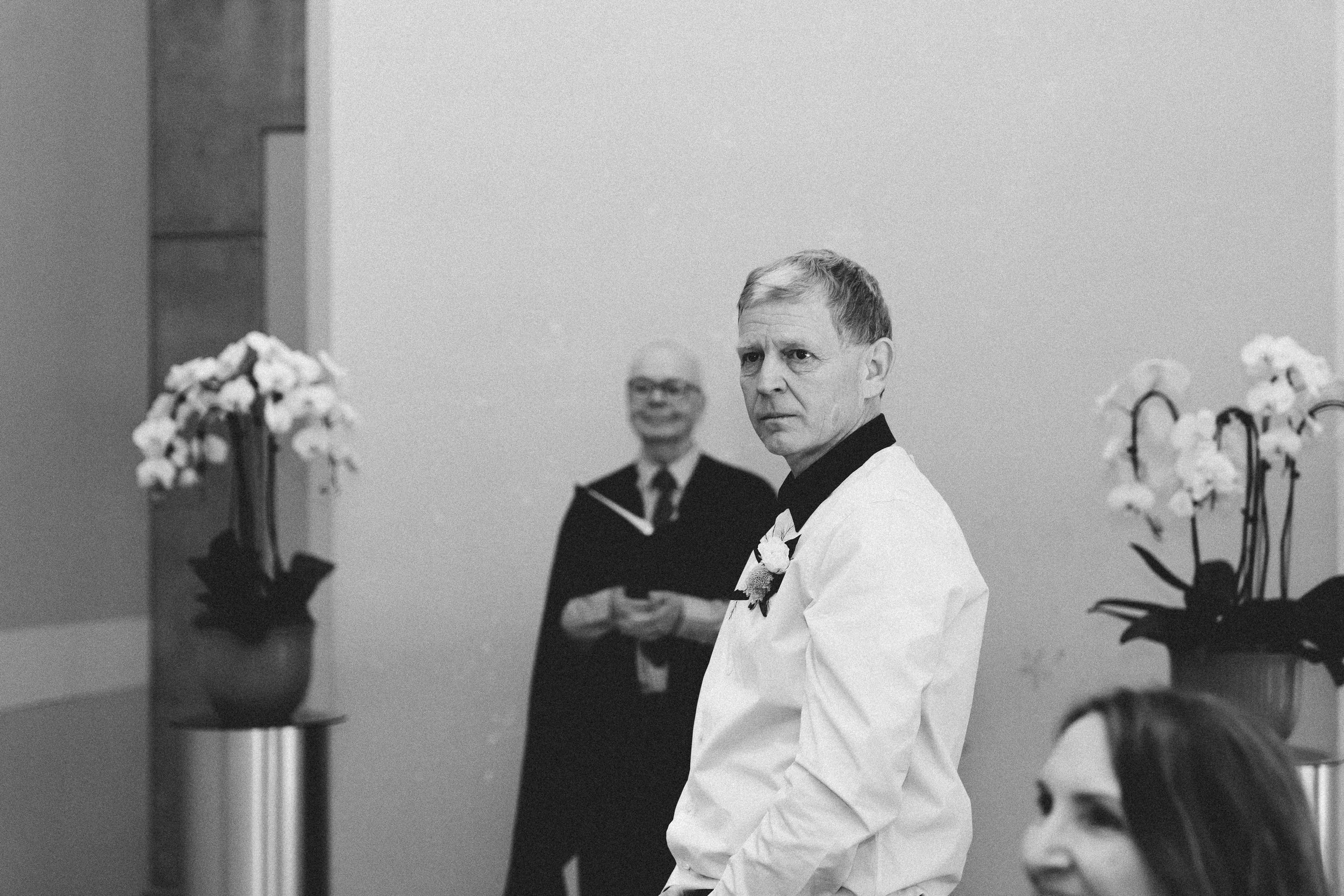Couple saying ‘I do’ during their civil ceremony at Toronto City Hall