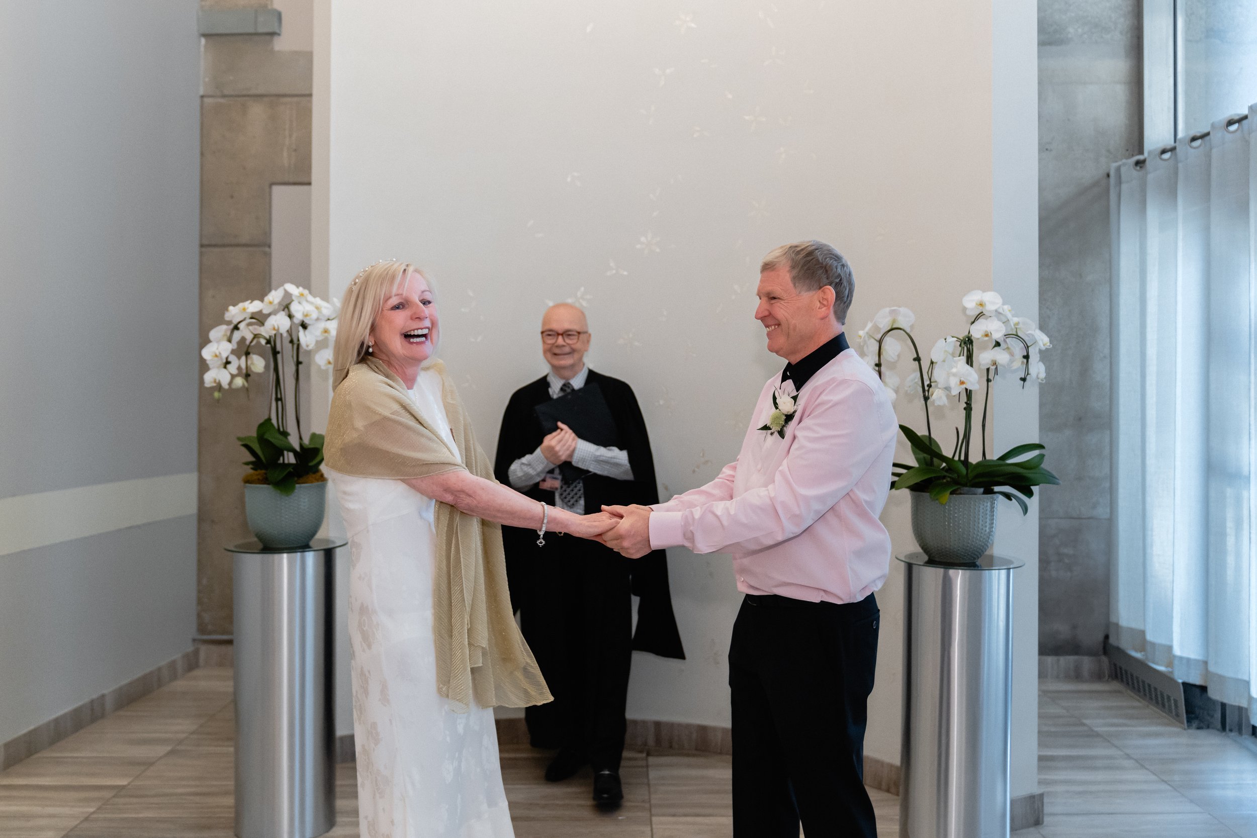 Couple seated at the front during their Toronto City Hall elopement