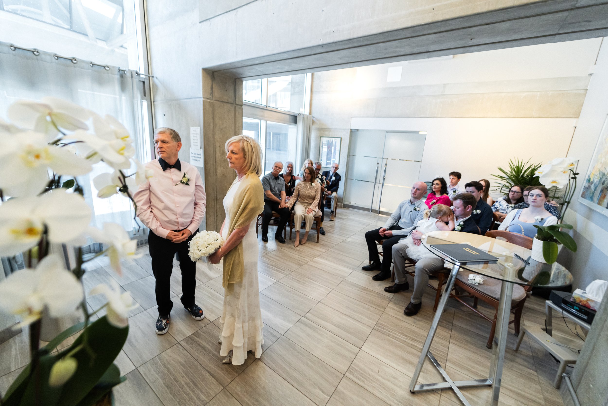 Civil wedding ceremony for older couple inside Toronto City Hall