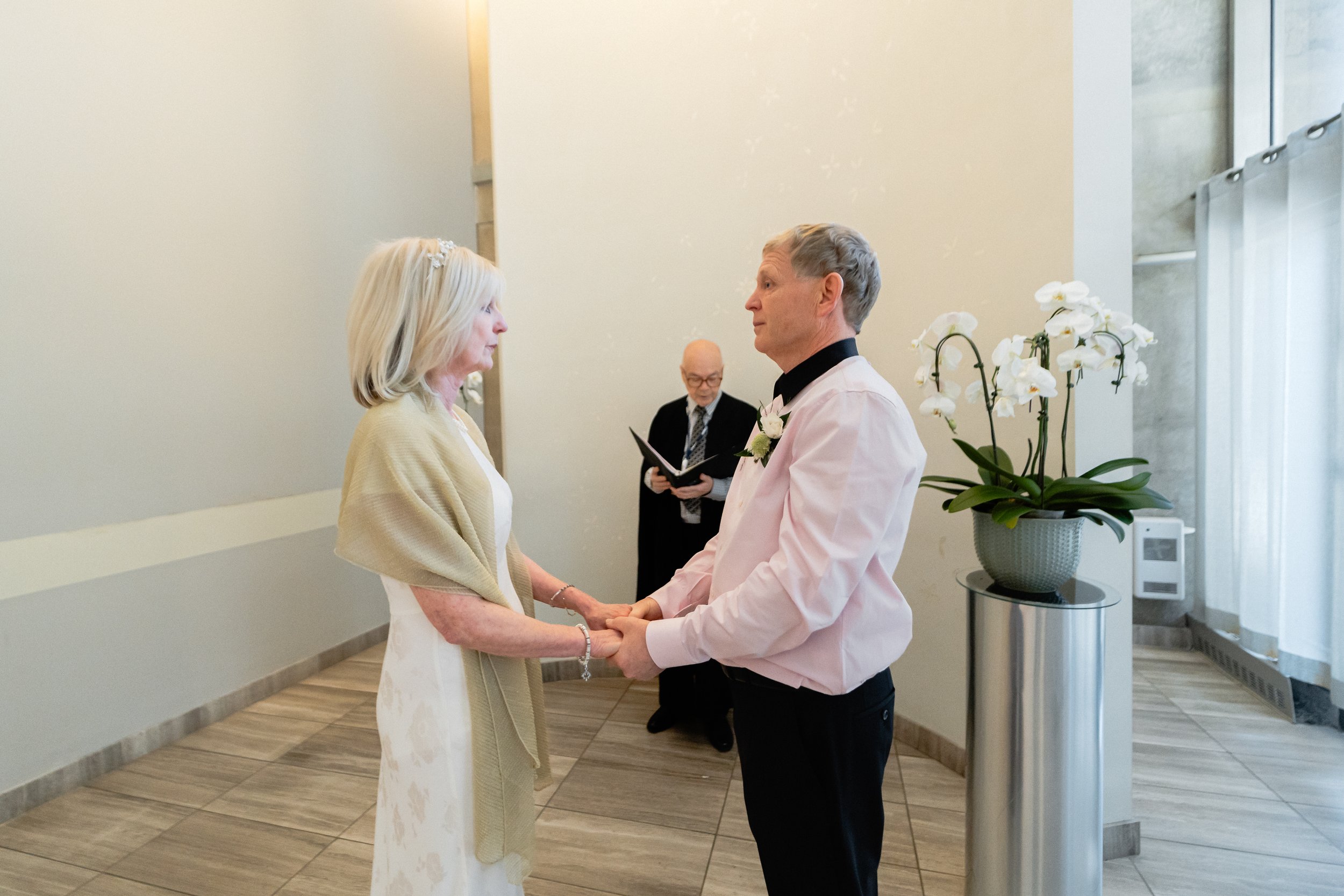 City Hall officiant leading intimate wedding ceremony in downtown Toronto