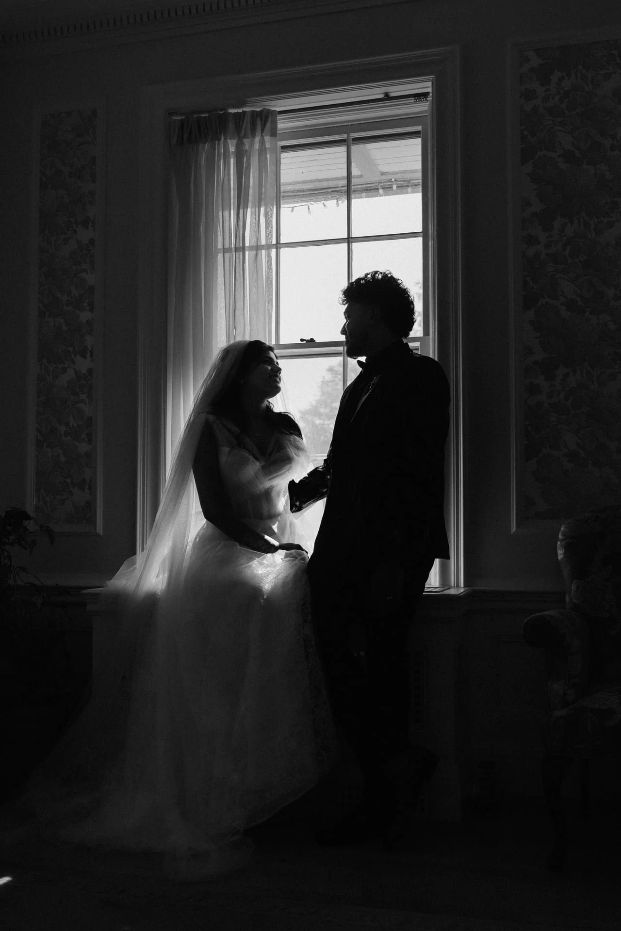 heintzman-house-wedding-photography-markham-ceremony-couple-by-window.jpg