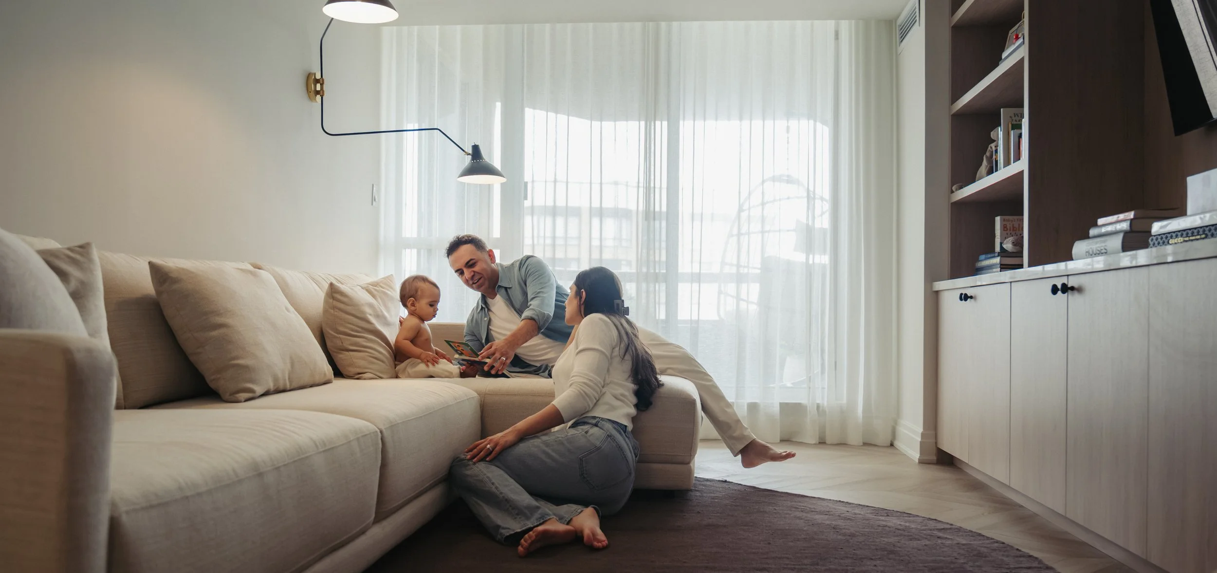 in-home-family-photos-toronto-family-of-three-living-room.jpg