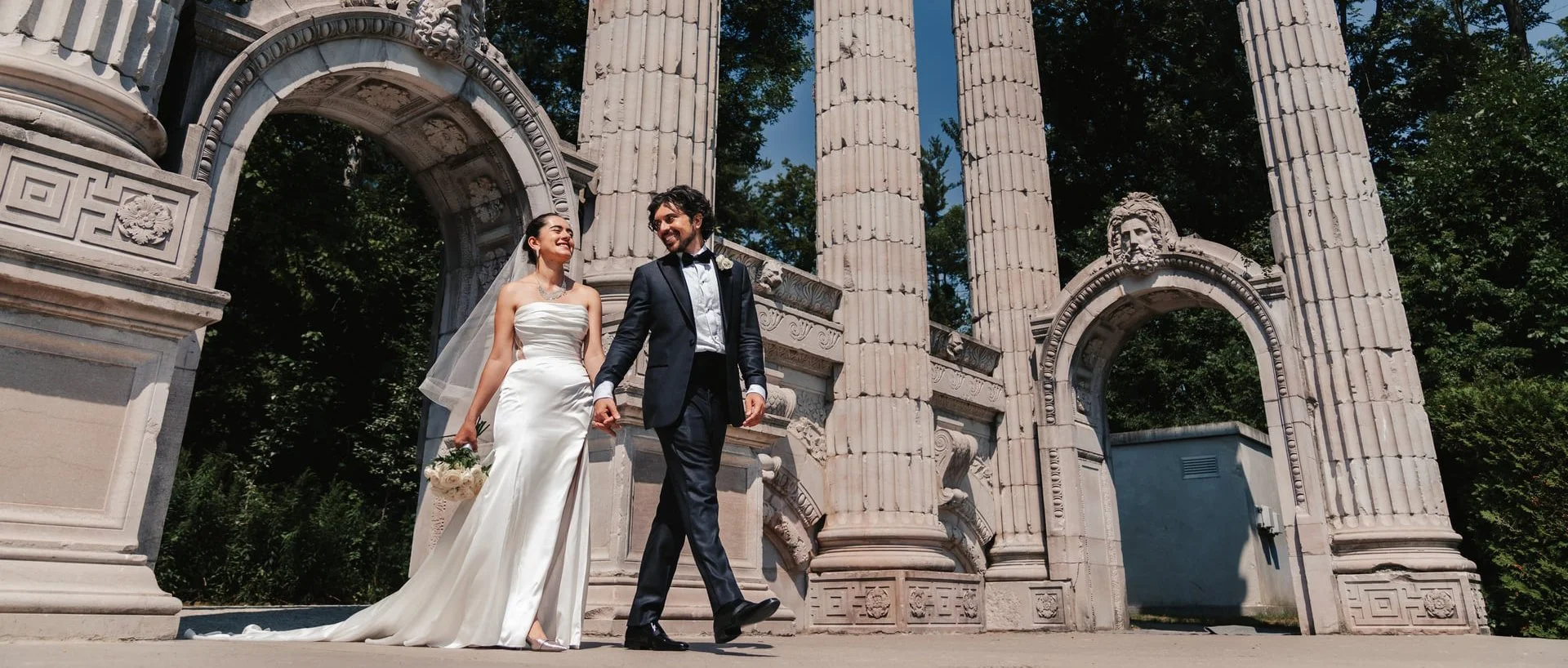 guild-park-wedding-toronto-couple-walking-colonnade.jpg