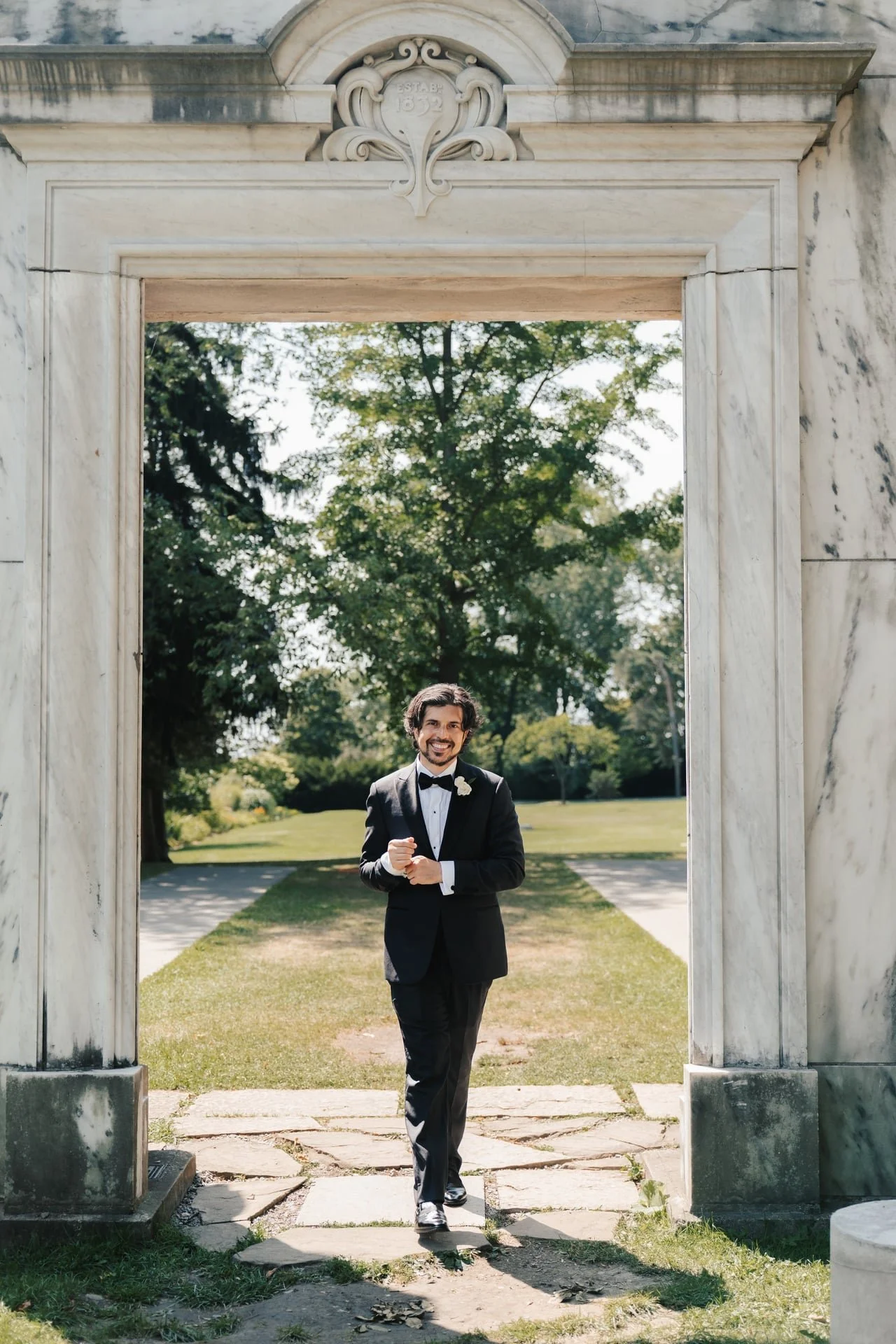 guild-park-wedding-toronto-groom-portrait-stone-archway.jpg