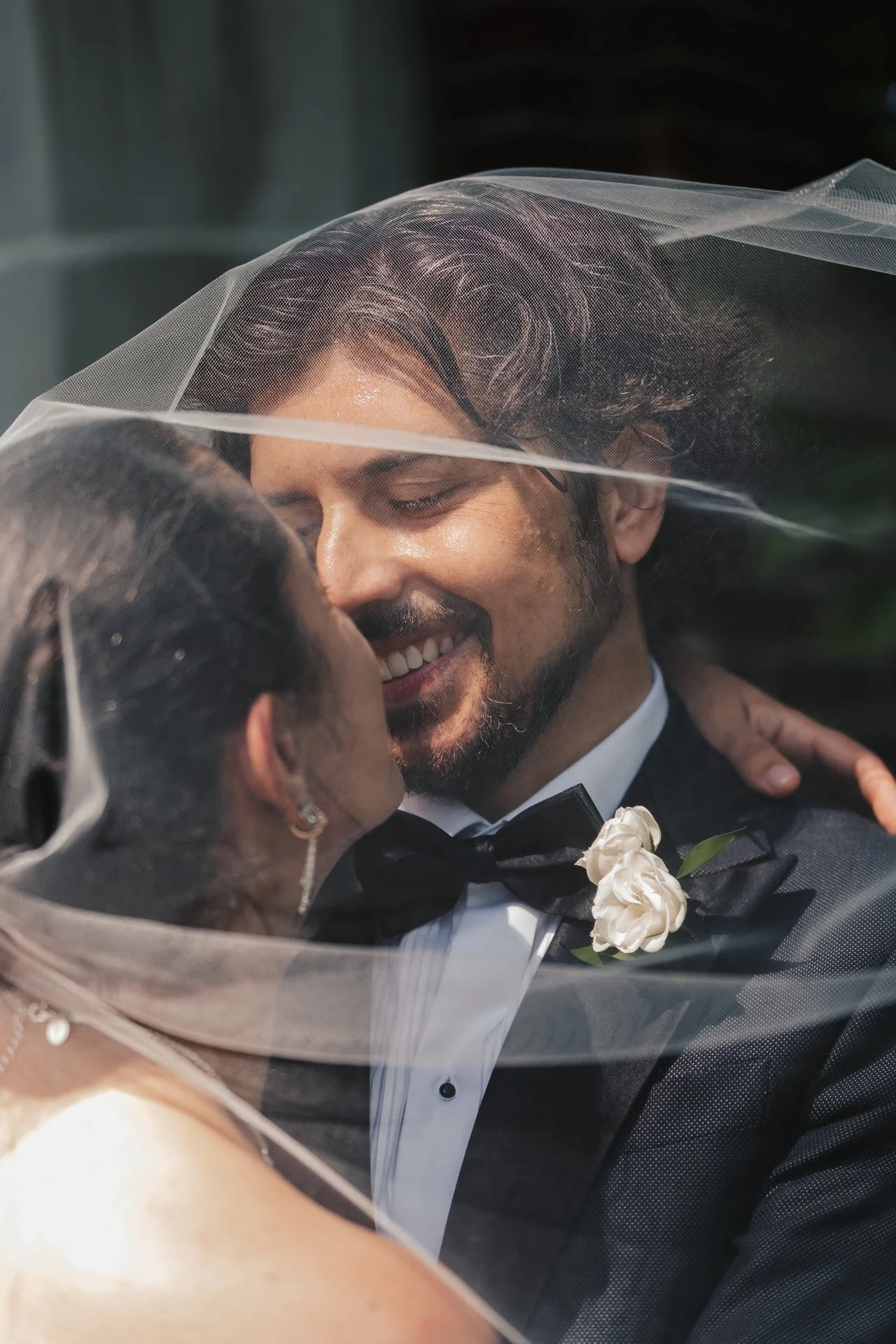 guild-park-wedding-toronto-couple-under-veil.jpg