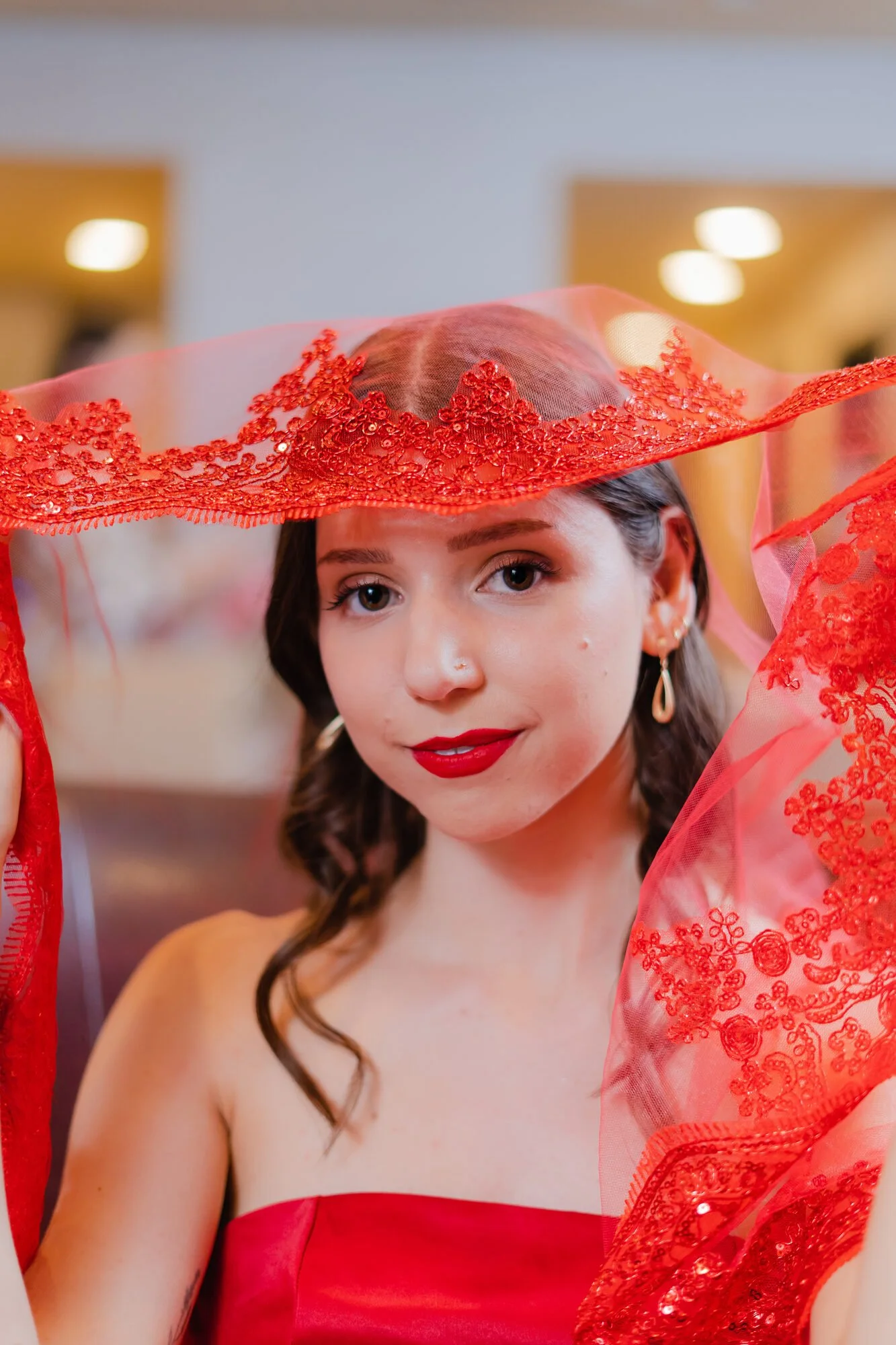kina-gecesi-toronto-bride-under-red-lace-veil.jpg