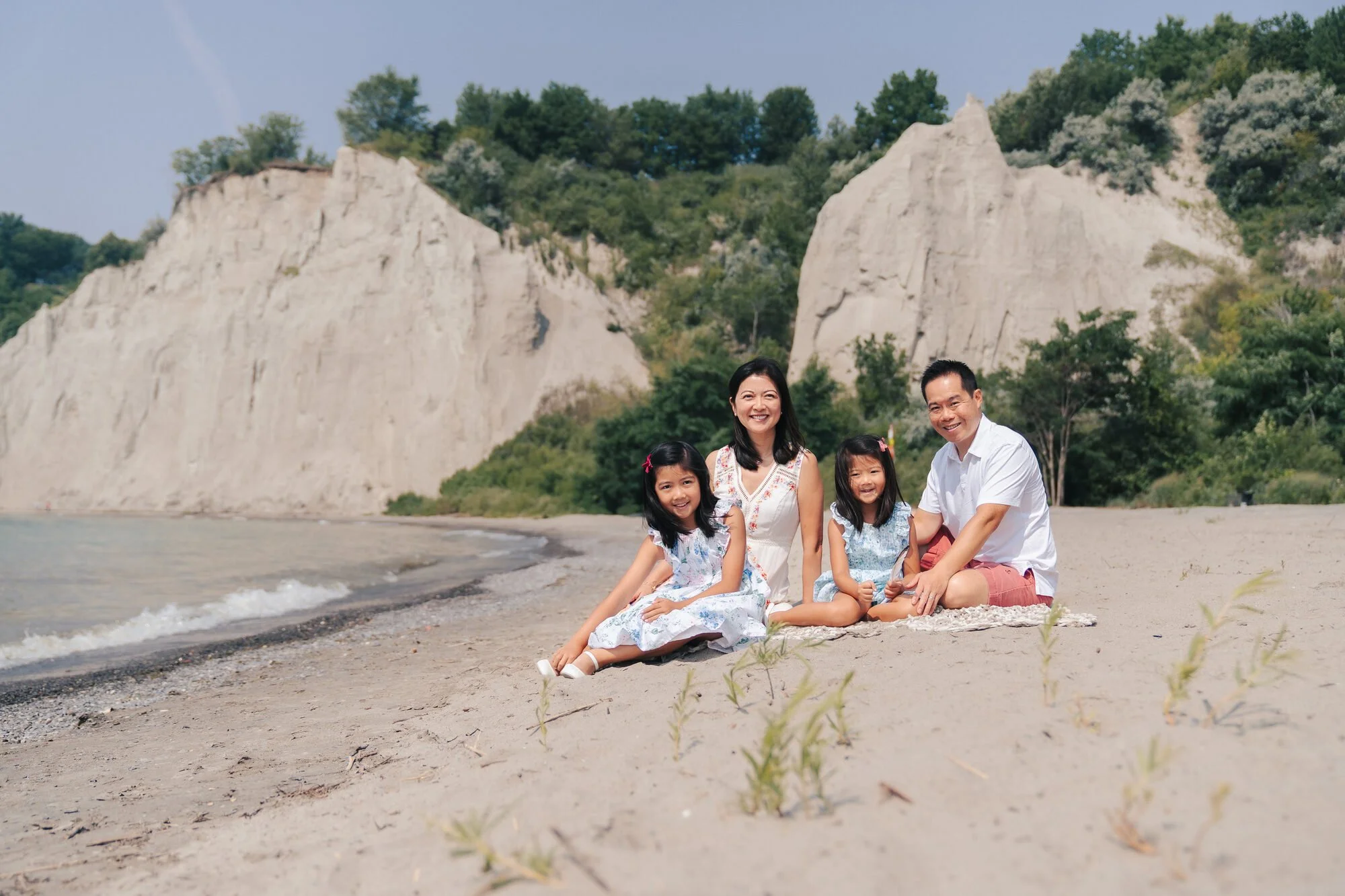 scarborough-bluffs-family-photography-sitting-on-the-sand.jpg