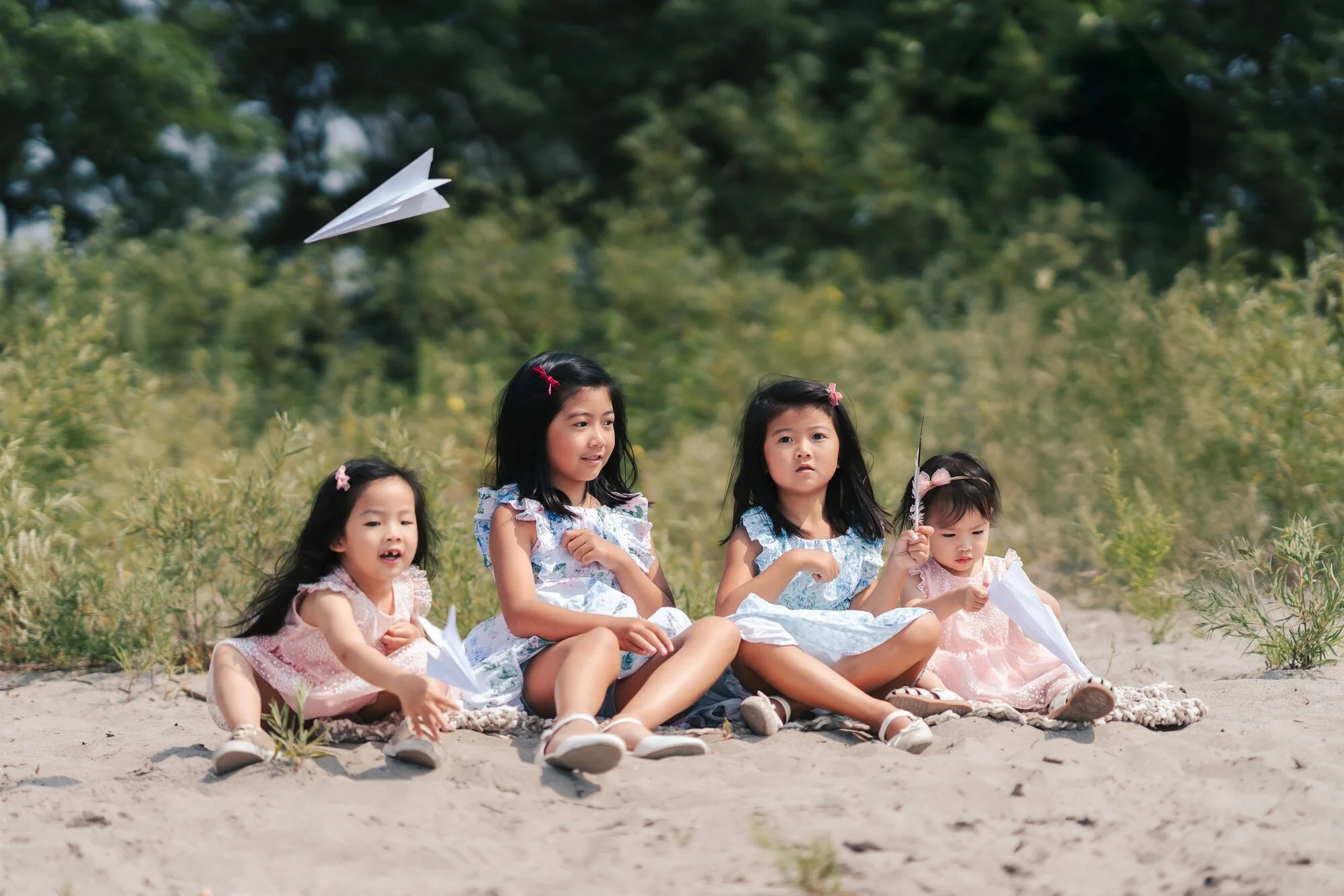 documentary-family-photography-toronto-kids-throwing-paper-planes.jpg