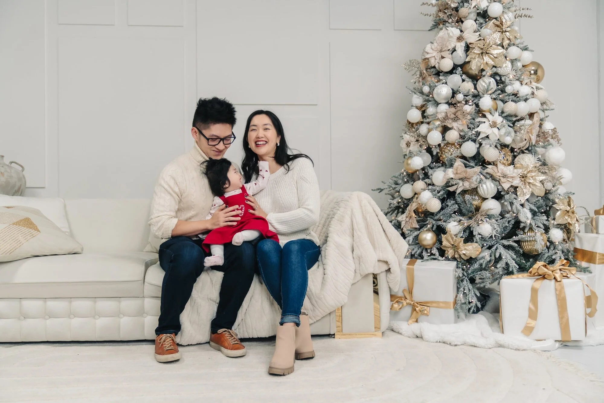 family-of-three-on-sofa-christmas-mini-icon-studio-space-toronto.jpg