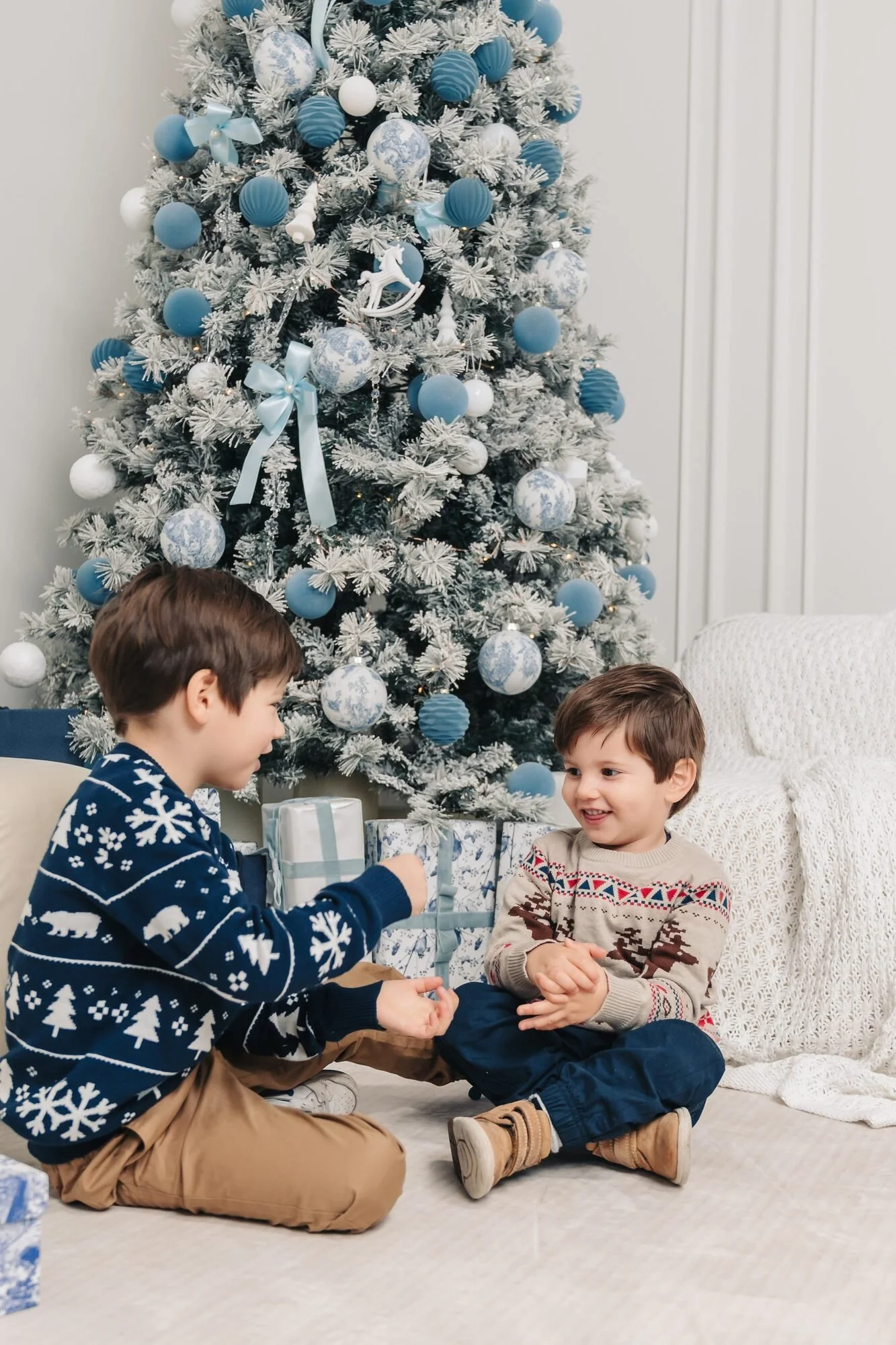 two-brothers-by-christmas-tree-icon-studio-space-toronto-holiday-photos.jpg
